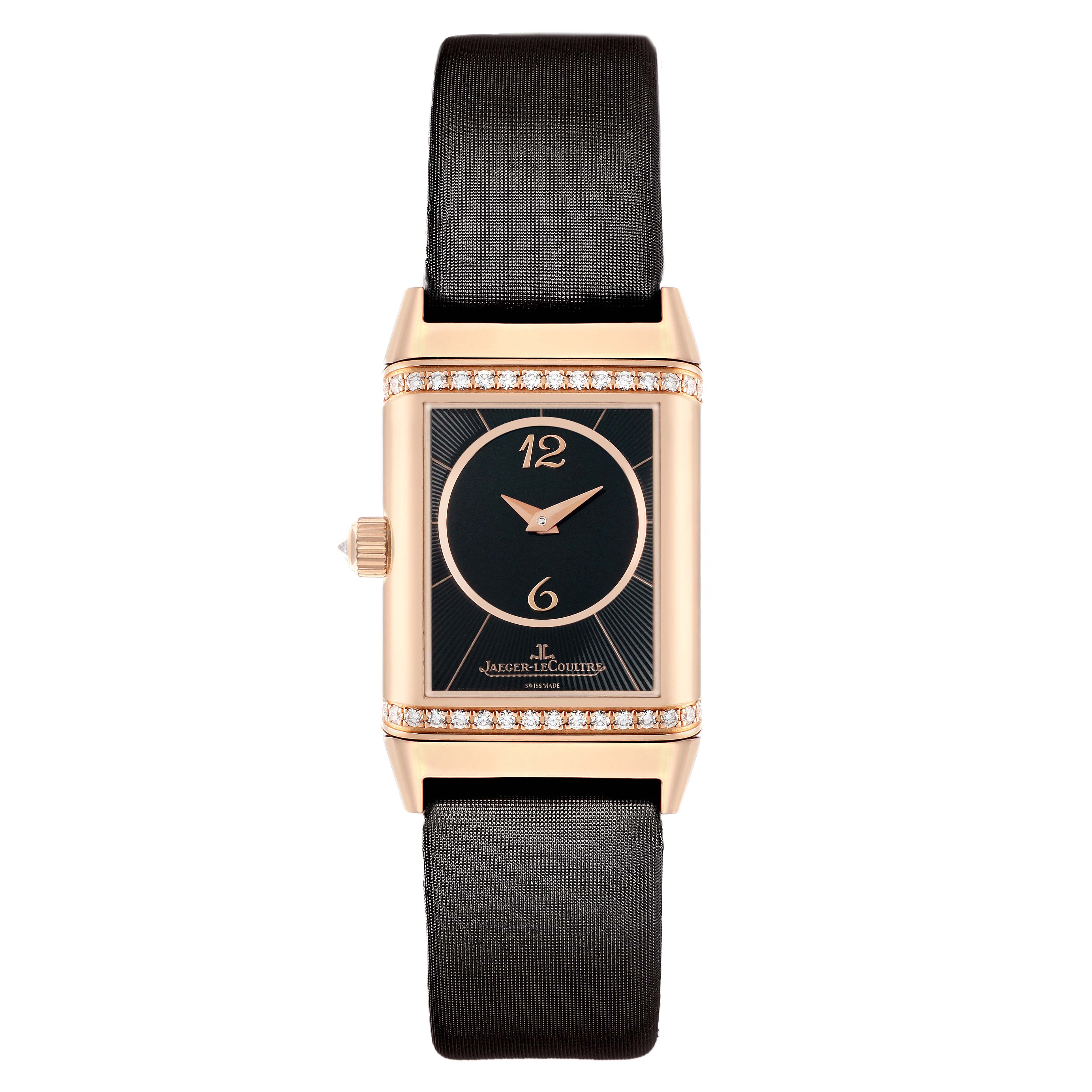 The Jaeger-LeCoultre Reverso is shown from the front, highlighting the rectangular dial, rose gold case, black strap, and diamond accents.