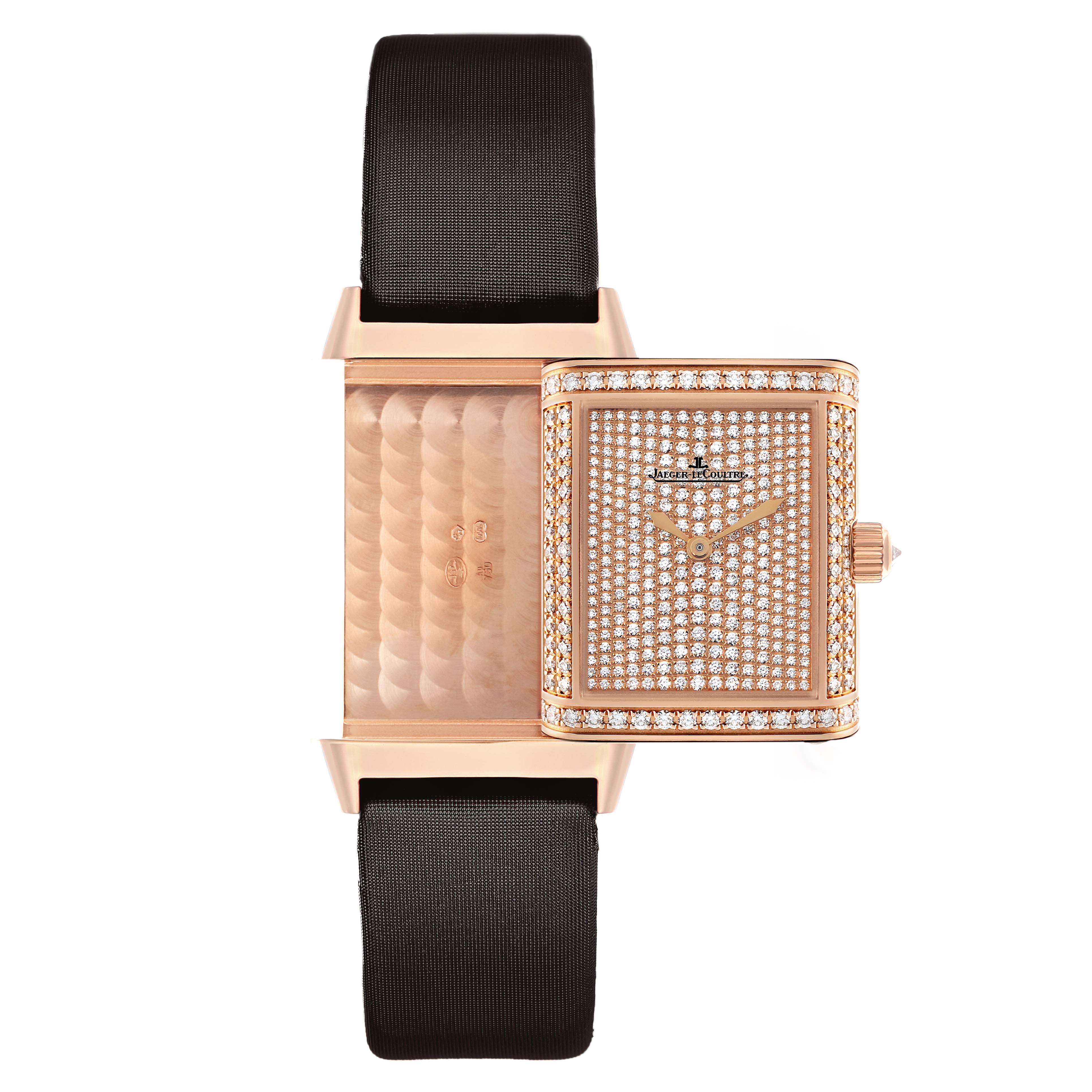 The Jaeger LeCoultre Reverso Q2562407 Women's Rose Gold Pink Dial watch is shown from the front with the case partially open, displaying the engraved back and diamond-studded front.