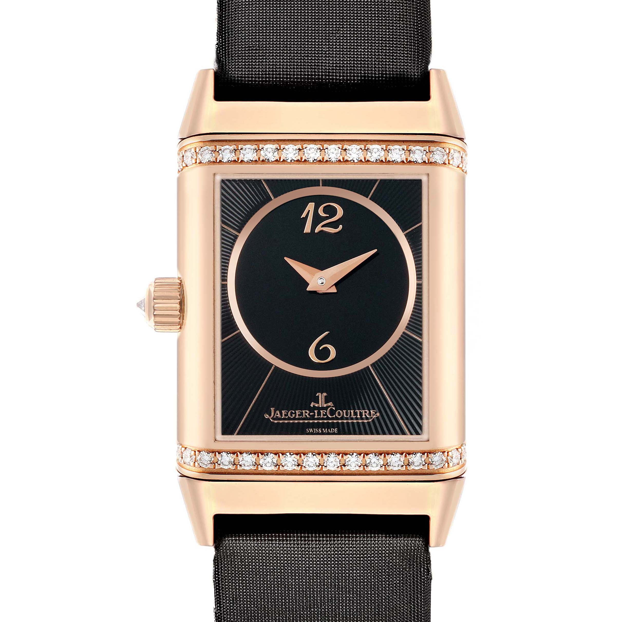 The image shows a frontal view of a Jaeger-LeCoultre Reverso watch with a rectangular case, black dial, and diamond accents.