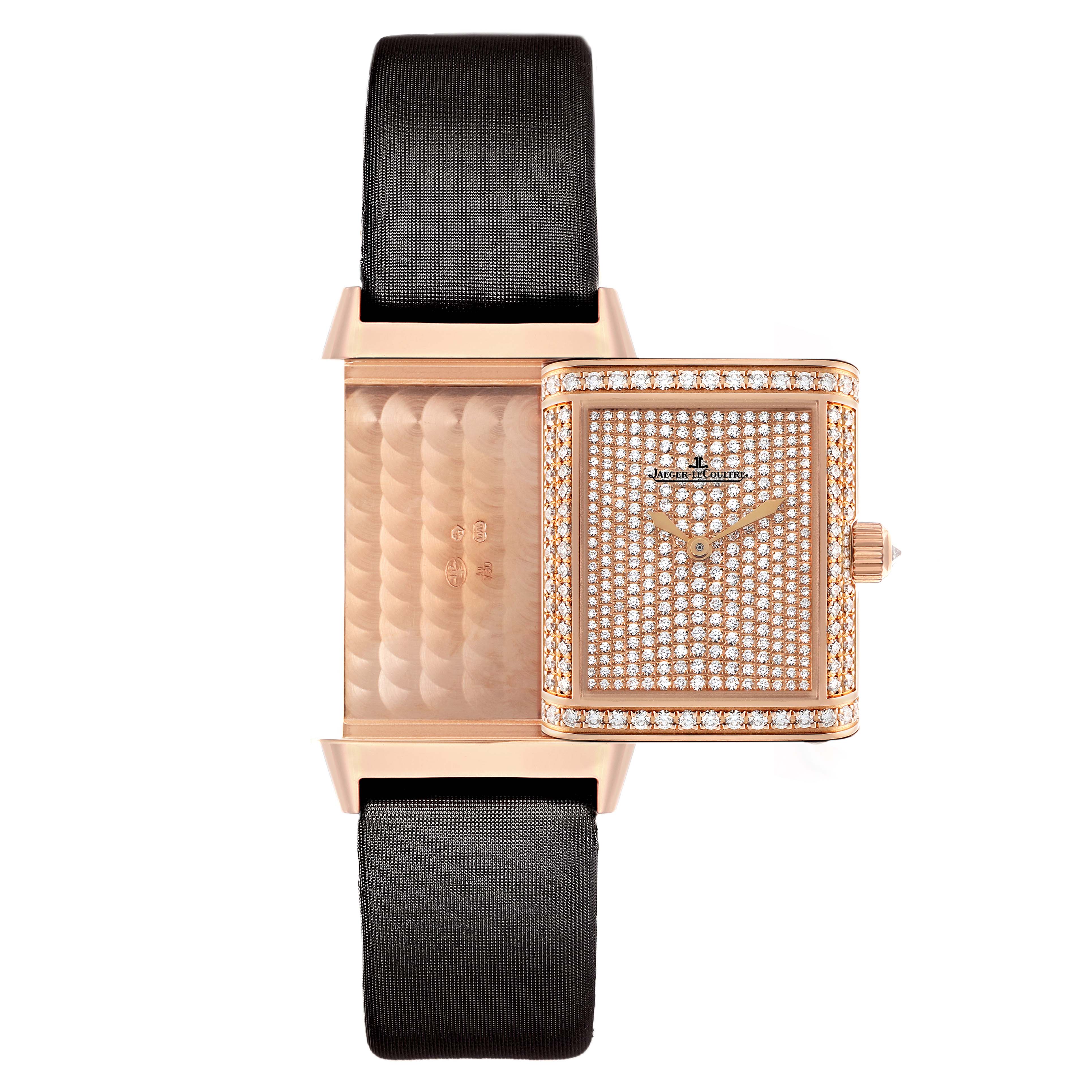 This image shows a Jaeger-LeCoultre Reverso watch with its case partially opened, revealing the inner side and diamond-studded face.