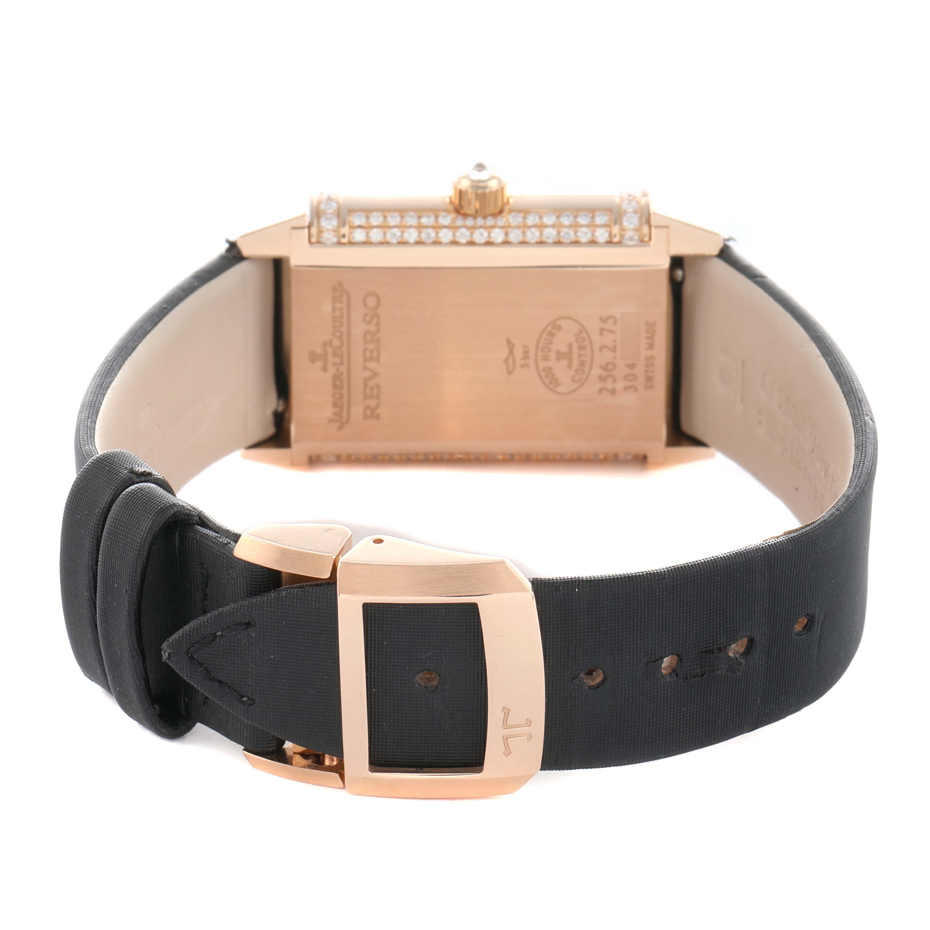 The image shows the back of a Jaeger LeCoultre Reverso Q2562407 Women
s Rose Gold Pink Dial watch with its strap and buckle visible.