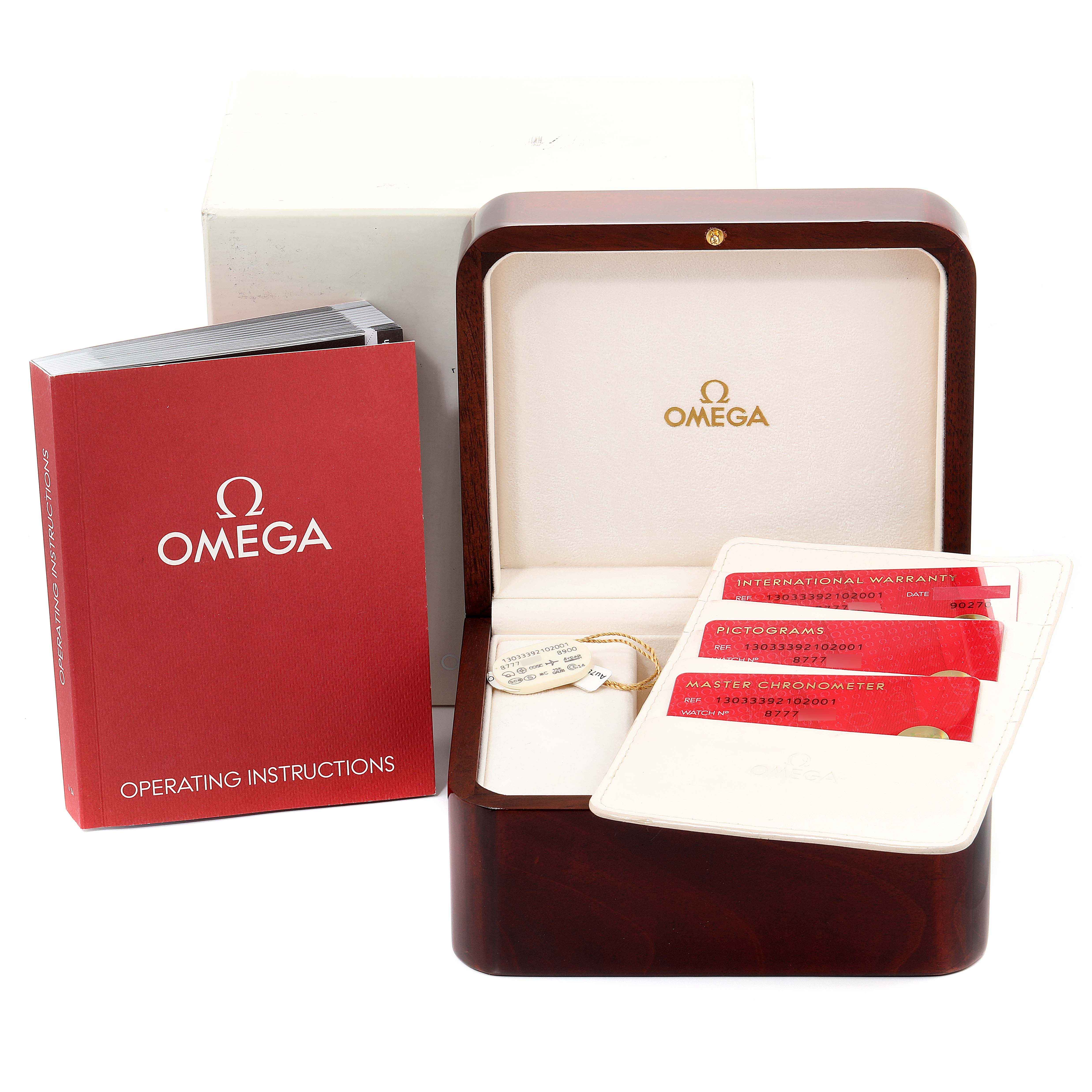 This image shows the packaging, operating instructions, warranty cards, and a wooden box for an Omega Constellation 130.33.39.21.02.001 Men's Stainless Steel Silver Dial 130.33.39.21.02.001 Men's Stainless Steel Silver Dial watch.