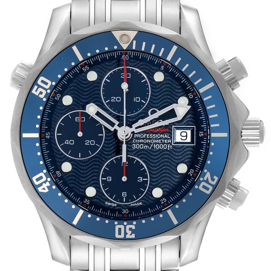 The image shows a front view of an Omega Seamaster watch, highlighting its blue dial, subdials, date window, and stainless steel band.