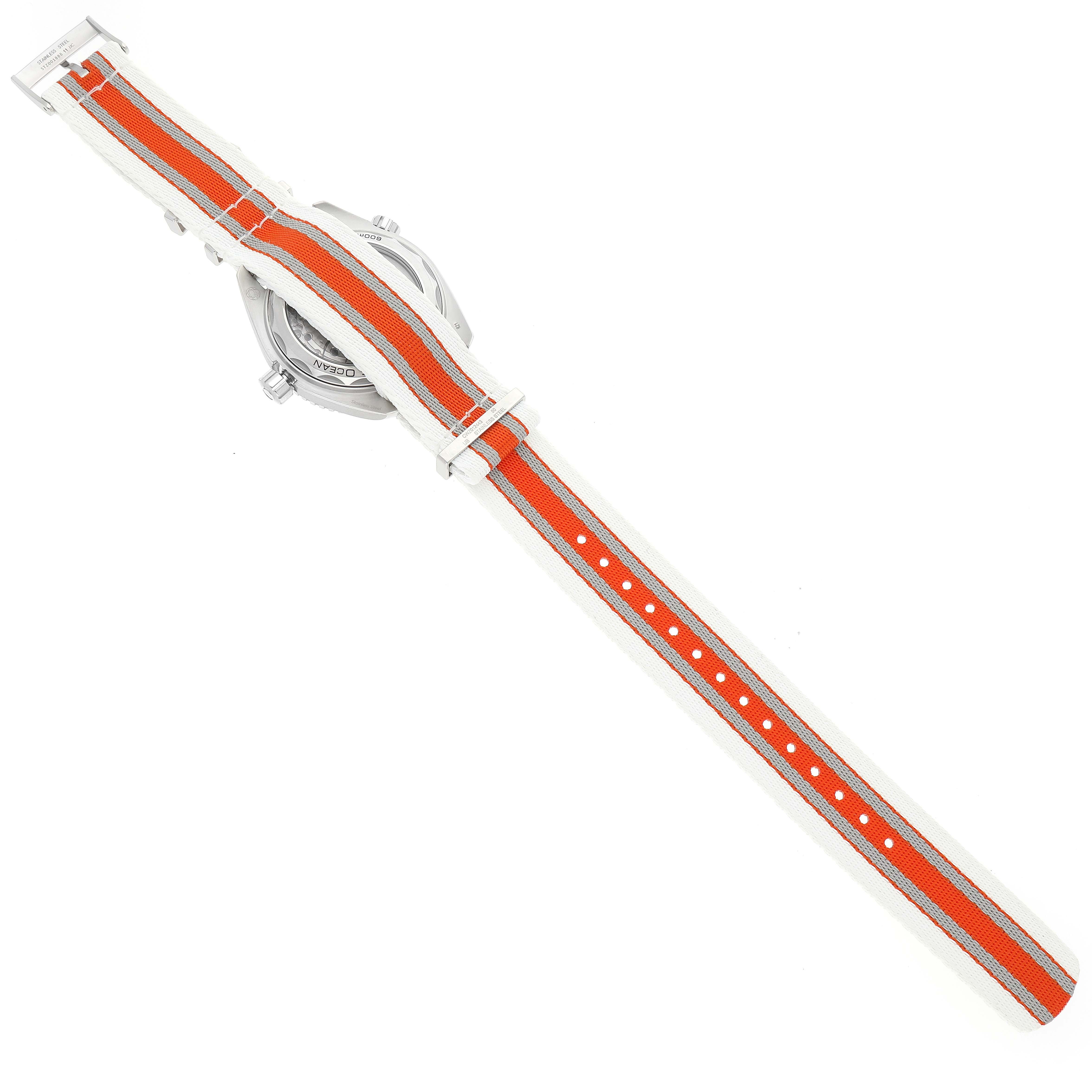 The Omega Planet Ocean 215.32.44.21.04.001 Men's Stainless Steel White Dial 215.32.44.21.04.001 Men's Stainless Steel White Dial watch is shown from the back, displaying its orange and white striped strap.
