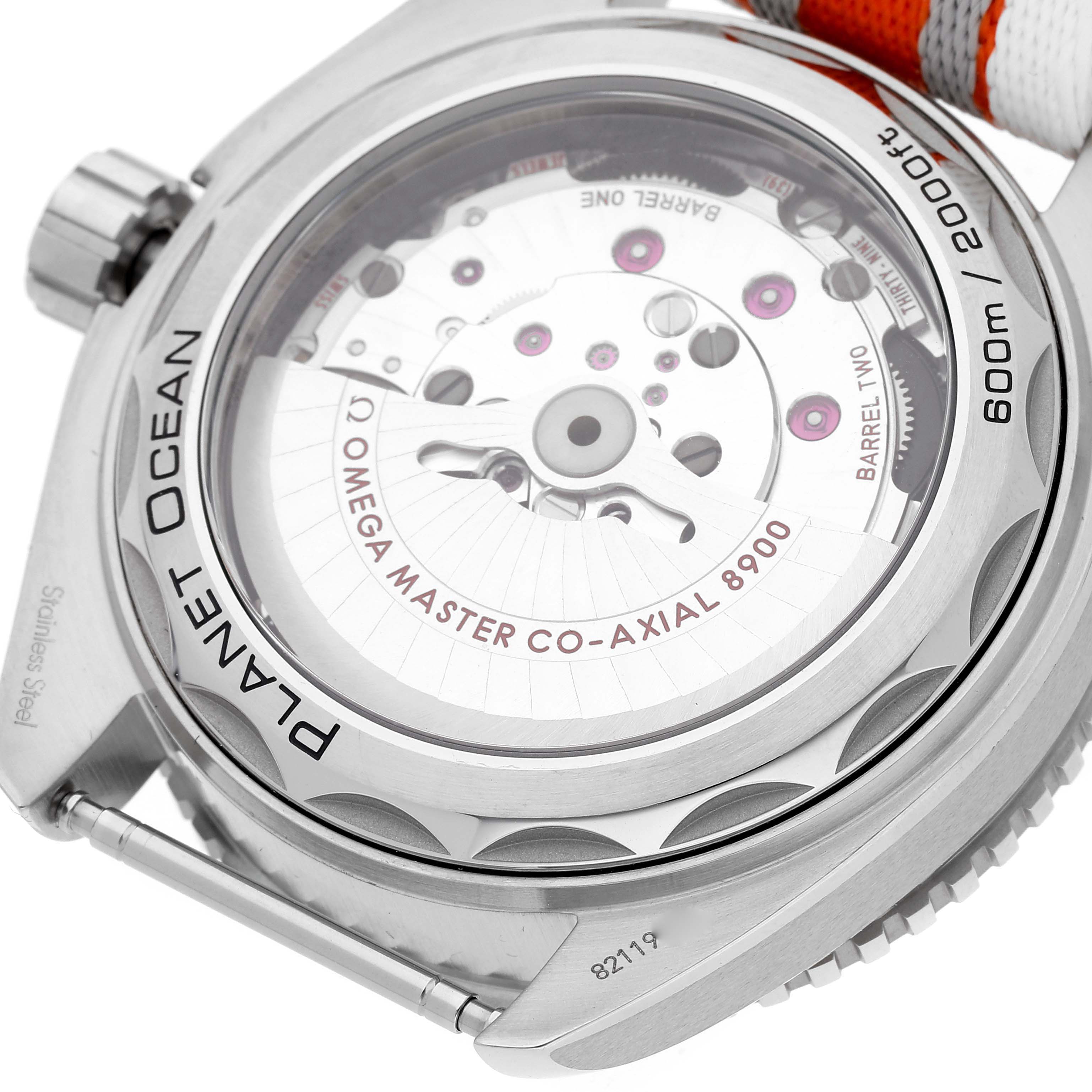 The image displays the back of an Omega Planet Ocean 215.32.44.21.04.001 Men's Stainless Steel White Dial 215.32.44.21.04.001 Men's Stainless Steel White Dial watch, showcasing its Omega Master Co-Axial 8900 movement.