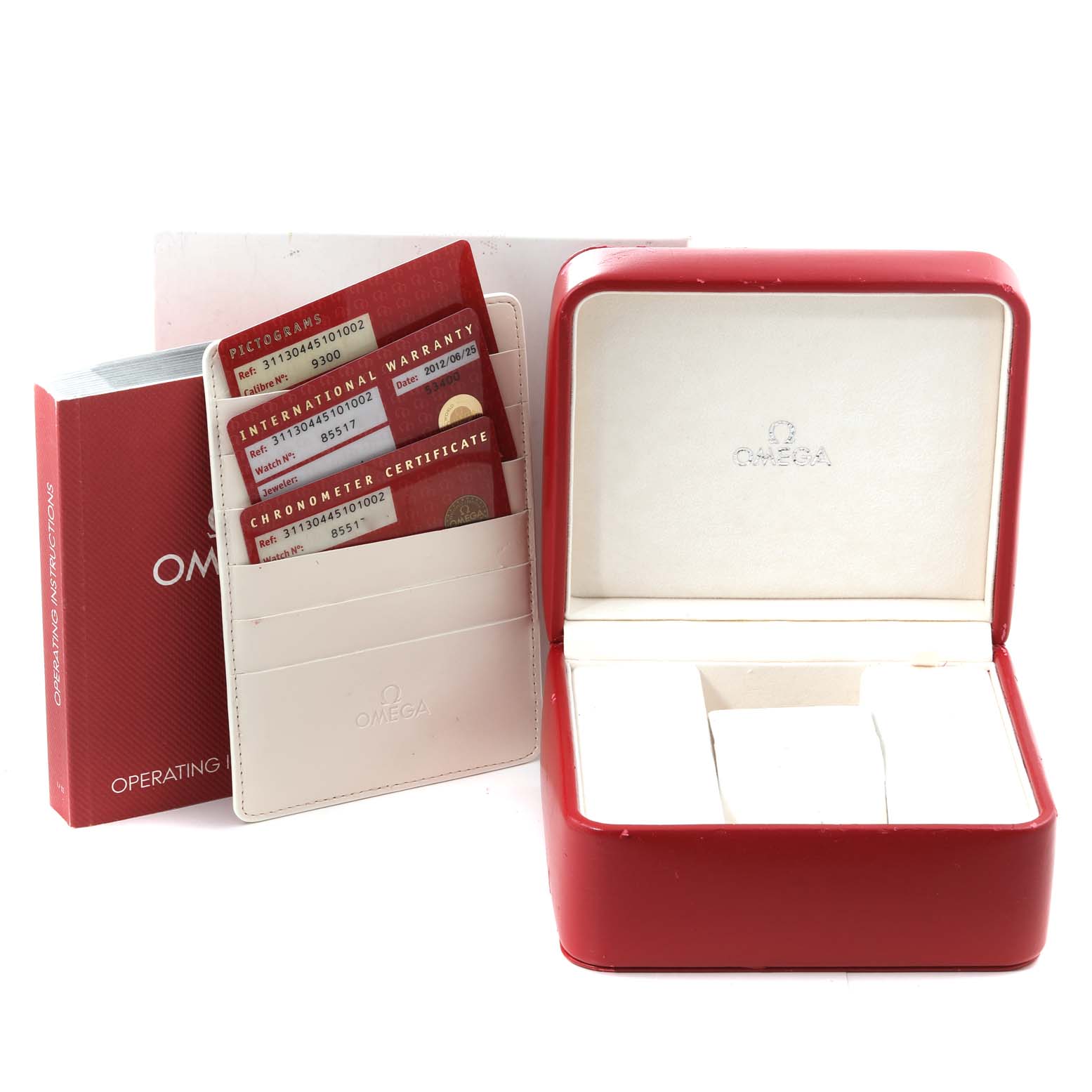 The image shows an open red Omega Speedmaster 311.30.44.51.01.002 Men
s Stainless Steel Black Dial 311.30.44.51.01.002 Men
s Stainless Steel Black Dial watch box, warranty cards, a cardholder, and an operating instructions booklet from a frontal angle.