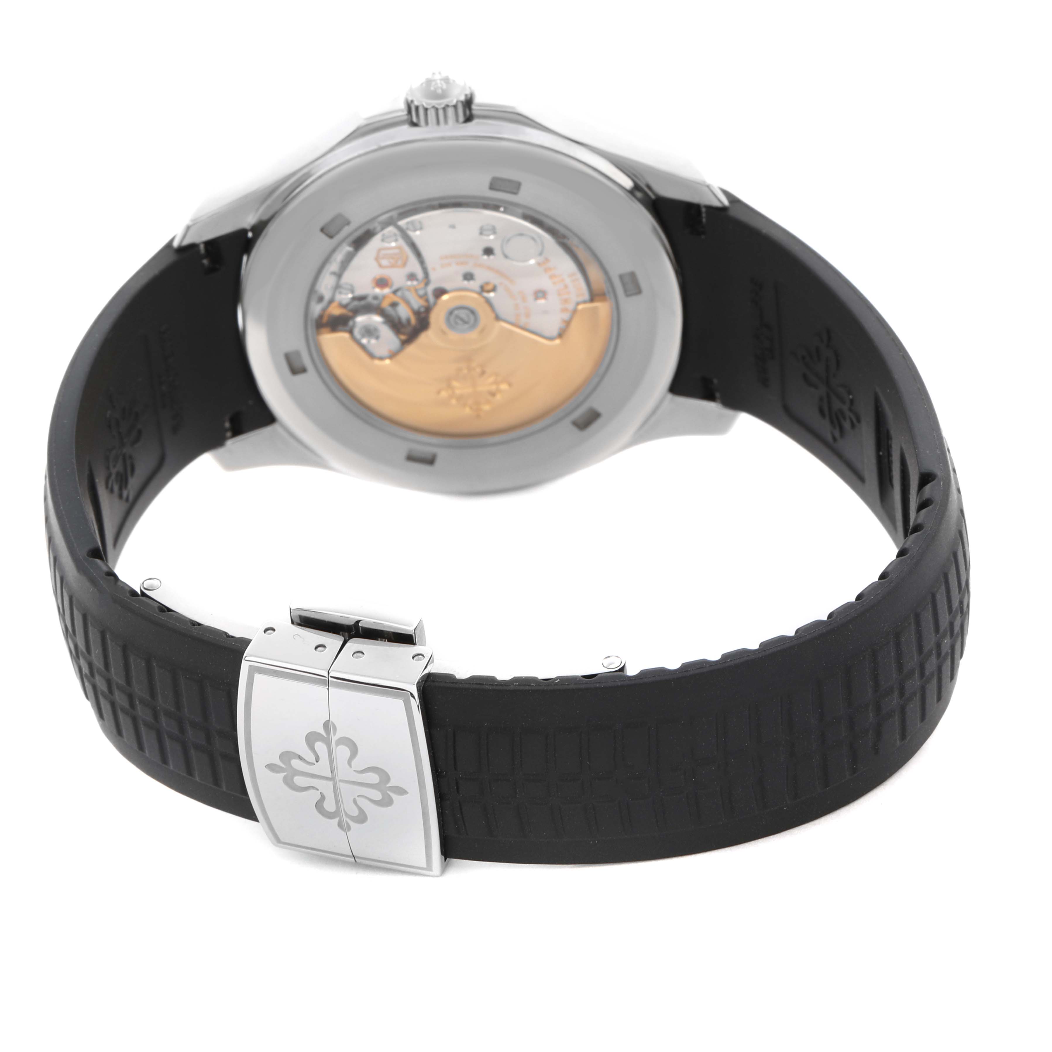 The Patek Philippe Aquanaut 5167A-001 Men's Stainless Steel Black Dial is shown from the back, highlighting the movement through a transparent case and the black strap with clasp.