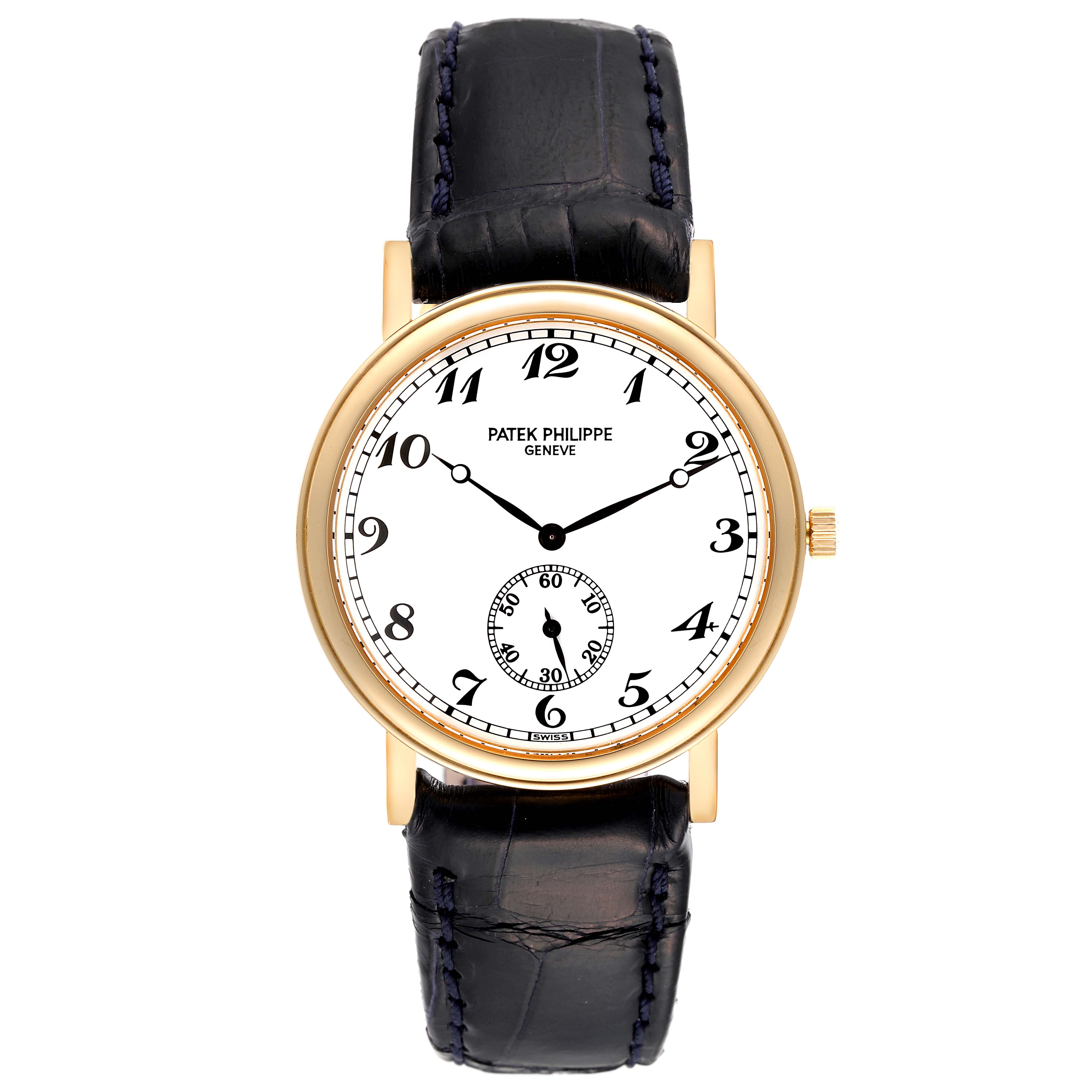 The image shows a front view of a Patek Philippe Calatrava 5022J Men
s Yellow Gold White Dial 5022J Men
s Yellow Gold White Dial watch, displaying its face, hour markers, hands, and leather strap.