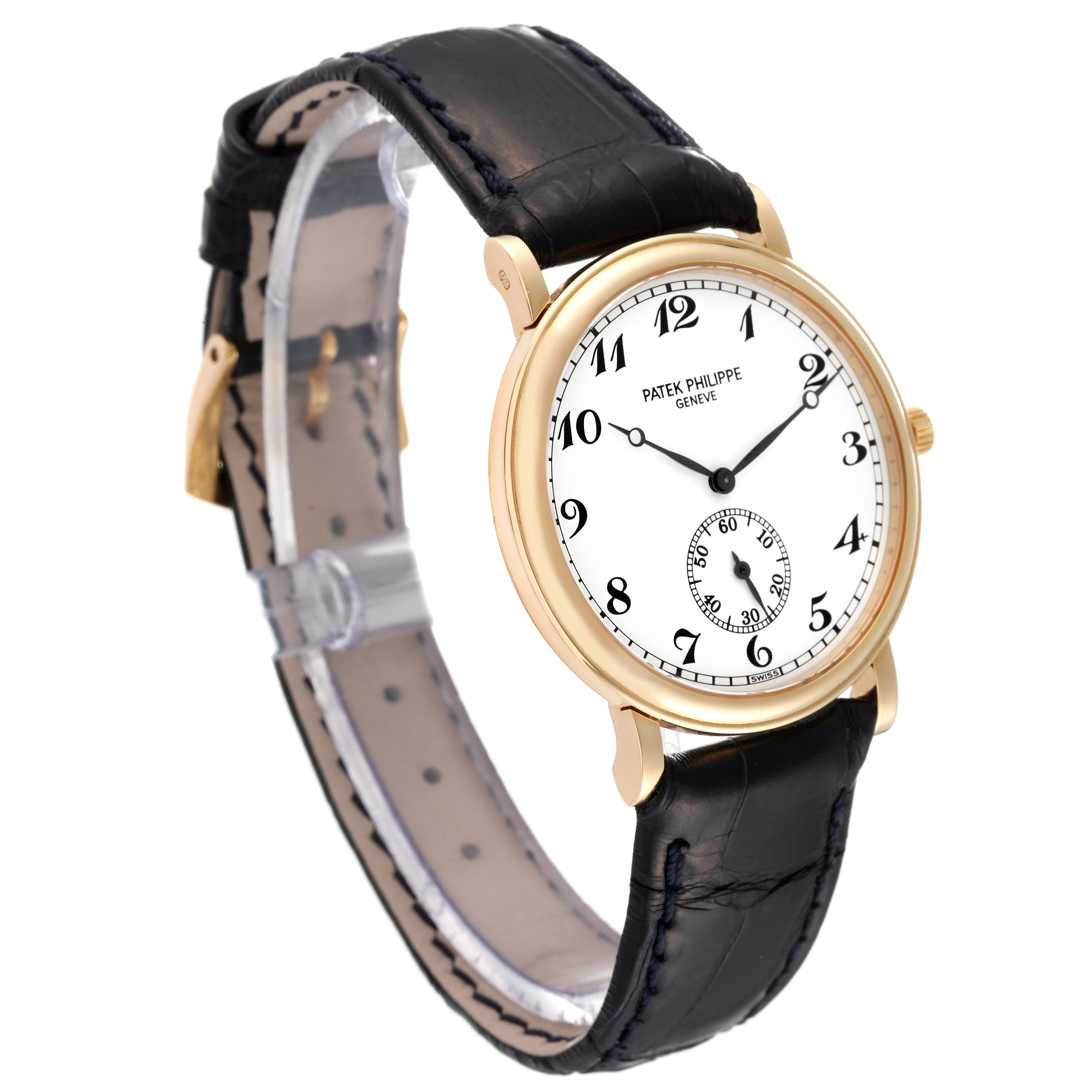 The image shows a Patek Philippe Calatrava 5022J Men
s Yellow Gold White Dial 5022J Men
s Yellow Gold White Dial watch at a slight angle, featuring the face, bezel, and leather strap.