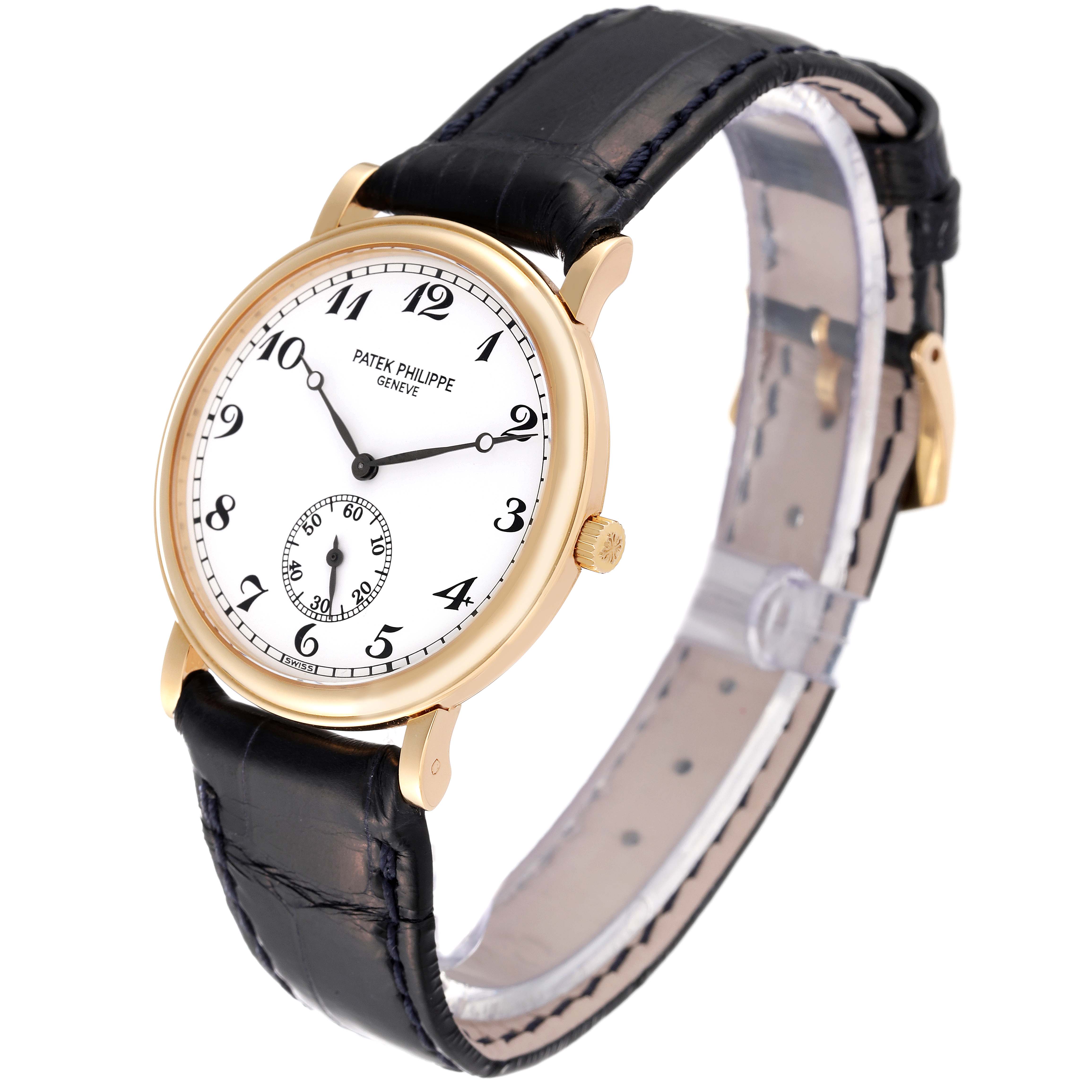 This image shows a Patek Philippe Calatrava 5022J Men
s Yellow Gold White Dial 5022J Men
s Yellow Gold White Dial watch from a front-side angle, highlighting the watch face, case, and black leather strap.