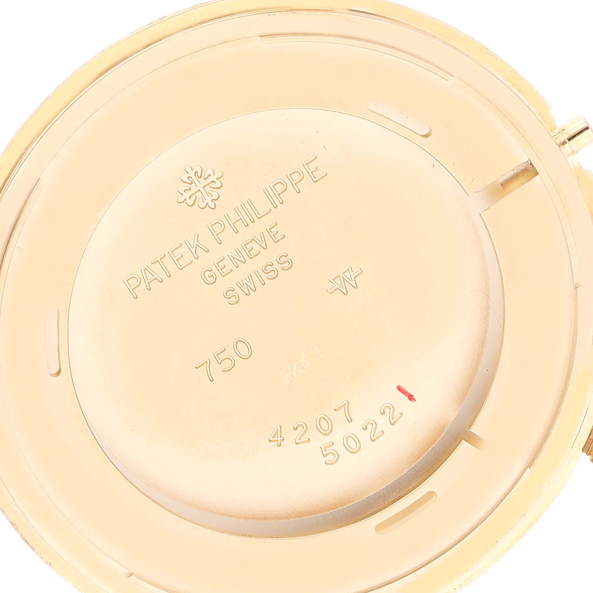 This image shows the back case of a Patek Philippe Calatrava 5022J Men
s Yellow Gold White Dial 5022J Men
s Yellow Gold White Dial watch, displaying engraved details and certifications.