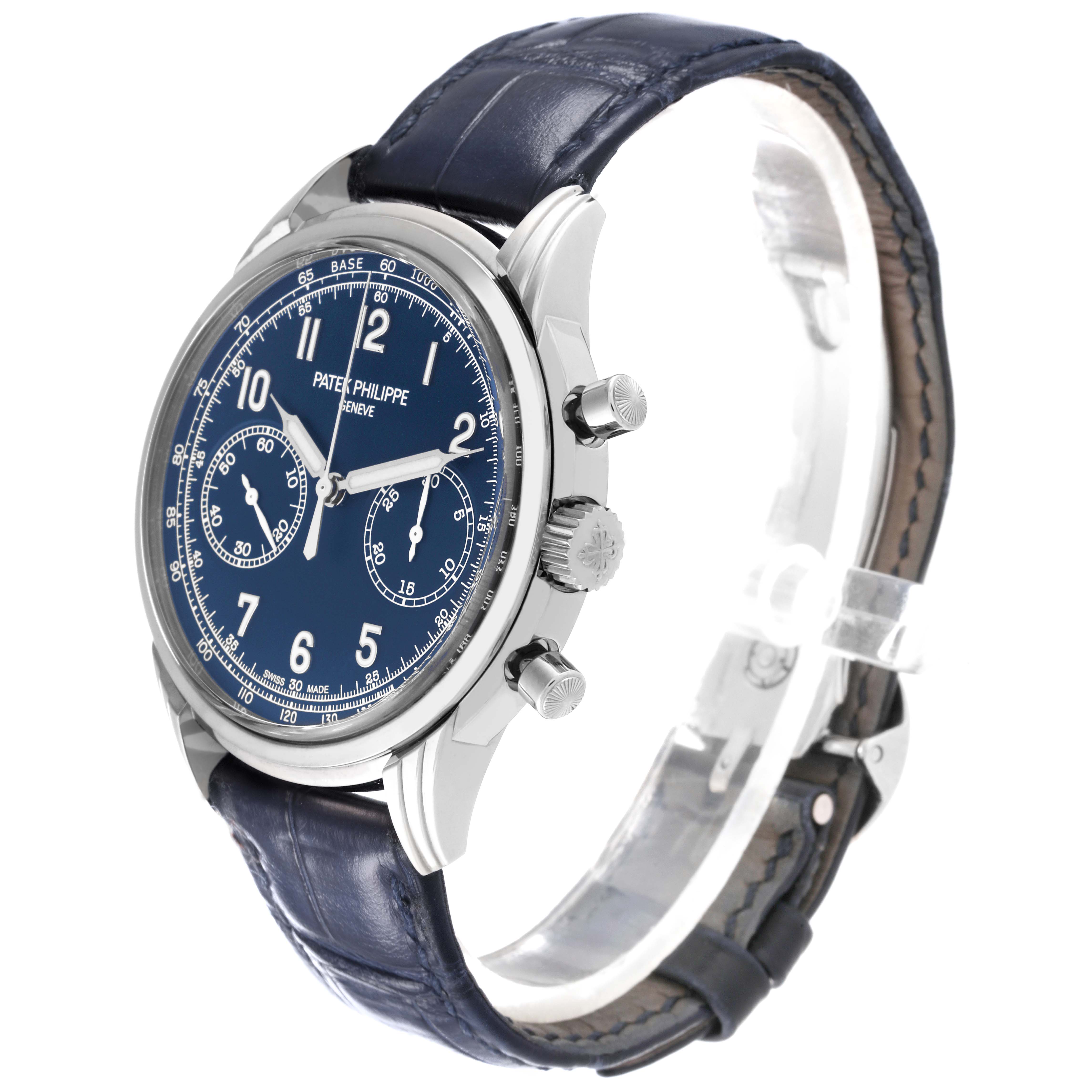 The image displays a Patek Philippe Complications 5172G-001 Men's White Gold Blue Dial 5172G-001 Men's White Gold Blue Dial model watch at a three-quarter angle, showing its dial, crown, pushers, and strap.