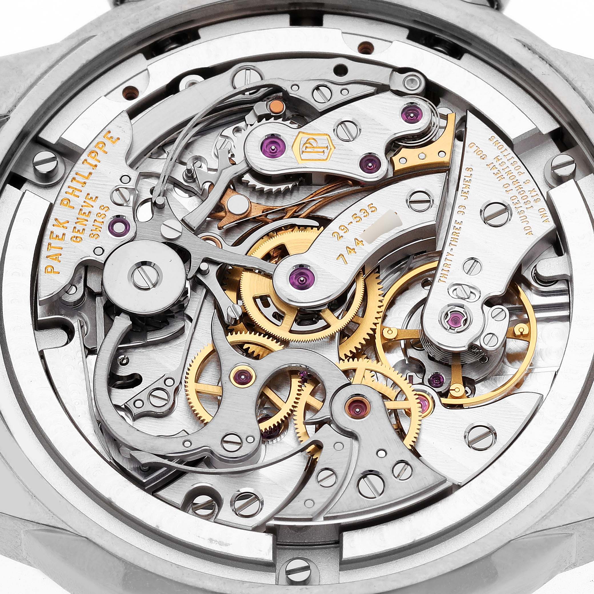 The image shows the intricate inner workings of a Patek Philippe Complications 5172G-001 Men's White Gold Blue Dial 5172G-001 Men's White Gold Blue Dial model watch from a back view.