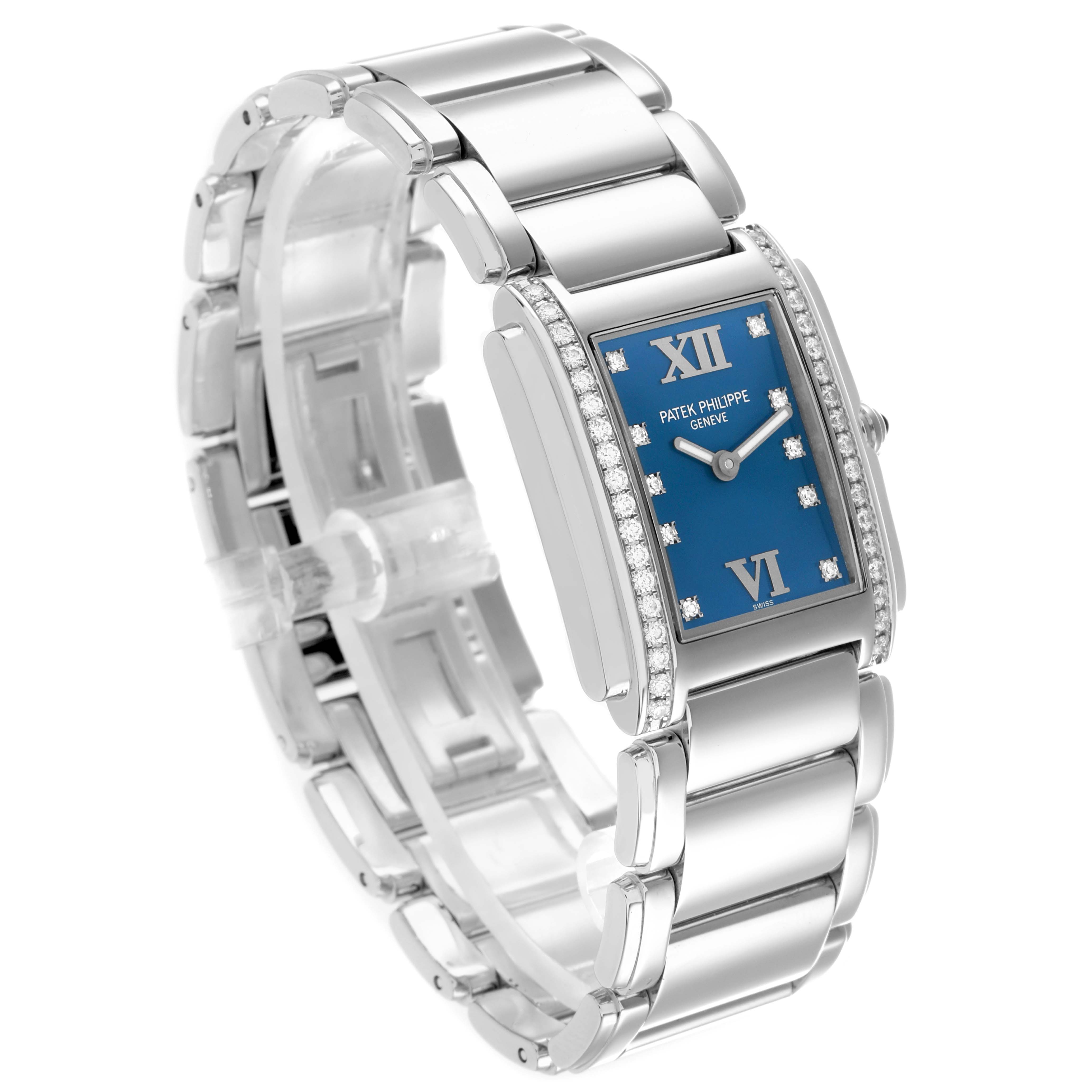The Patek Philippe Twenty-4 4910 Women
s Stainless Steel Blue Dial watch is shown at a three-quarter angle, highlighting its bracelet, blue dial, and diamond-set bezel.