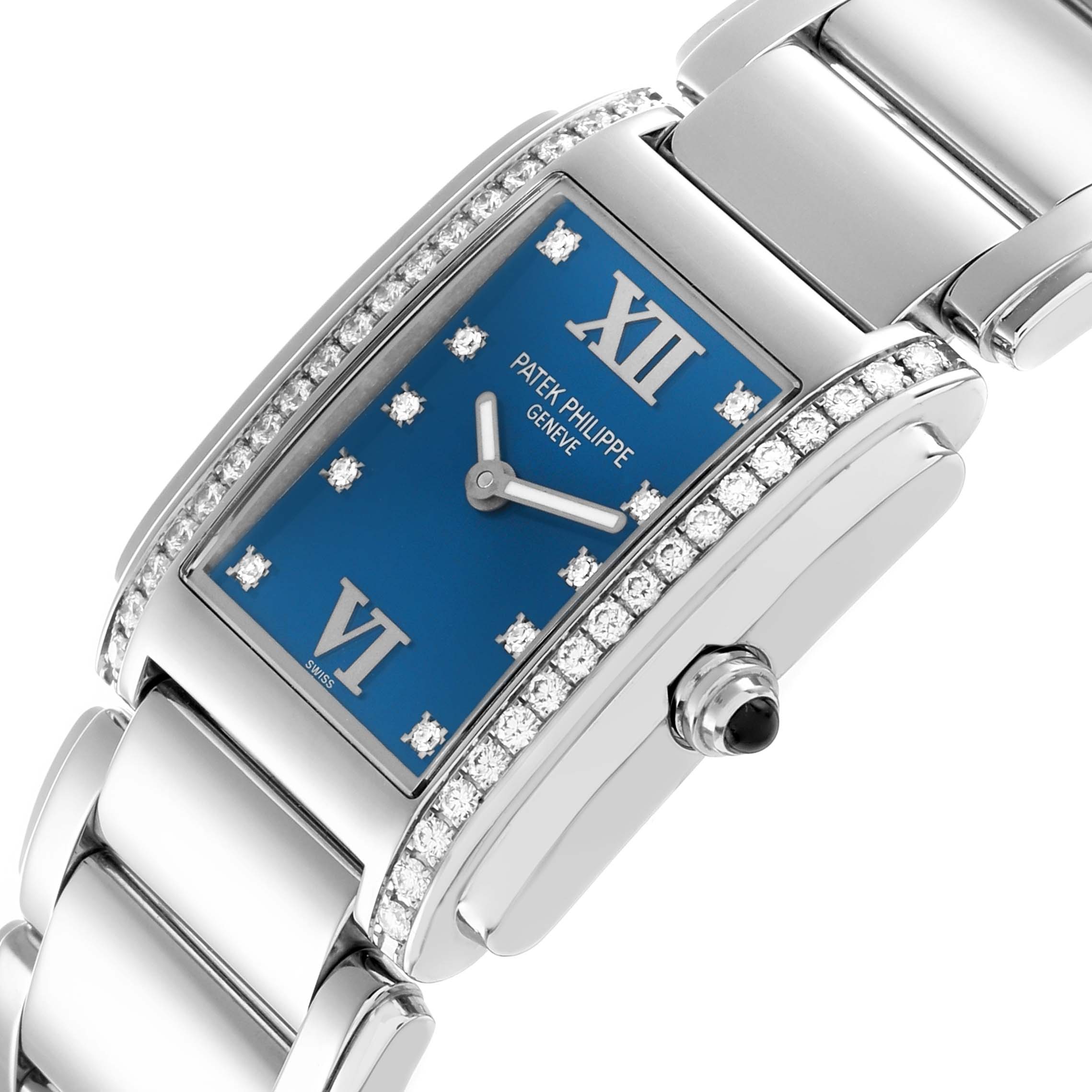 The Patek Philippe Twenty-4 4910 Women
s Stainless Steel Blue Dial watch is shown from a slightly angled side view, displaying the dial, bracelet, and crown.
