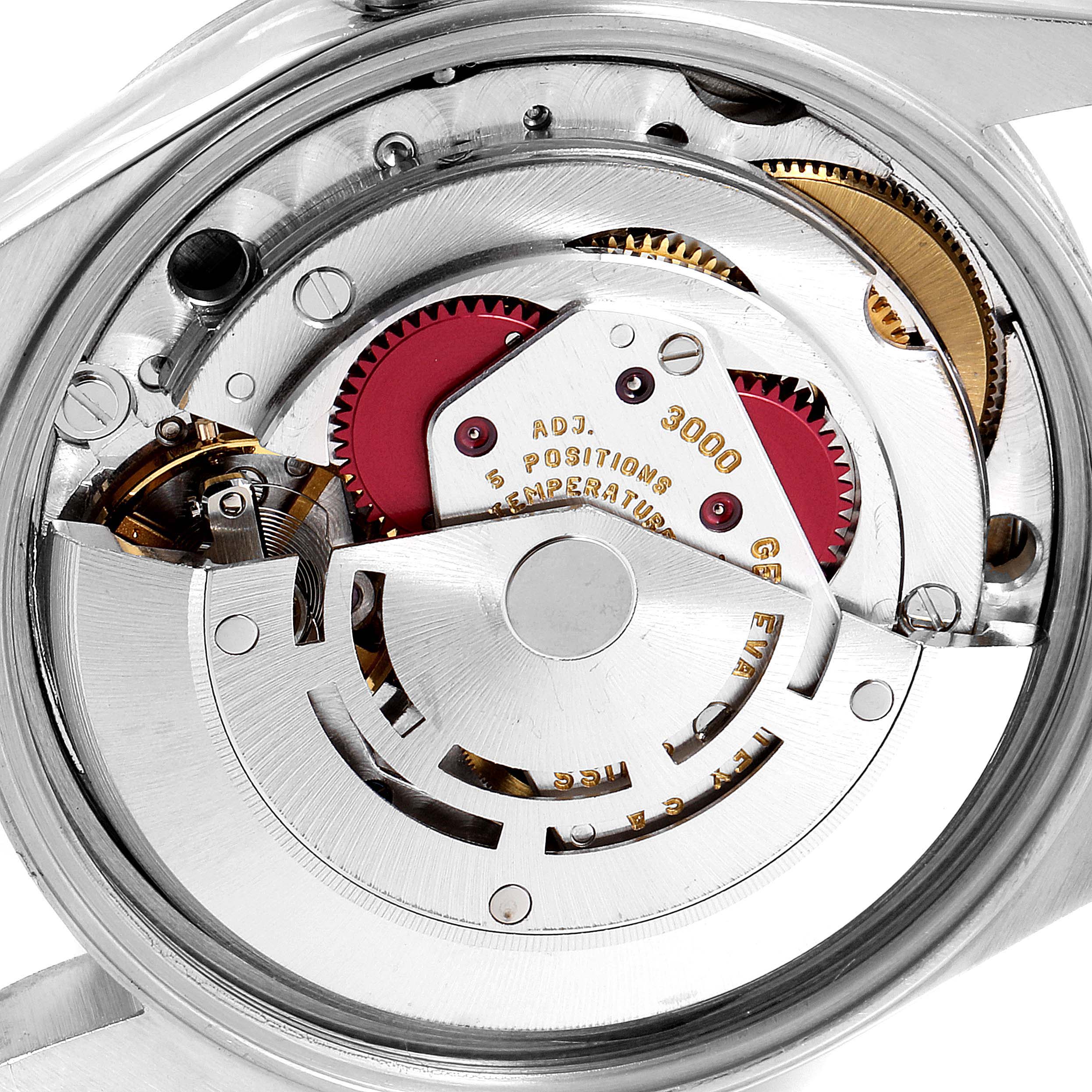 This close-up image shows the intricate inner mechanism of a Rolex Air-King 14000 Men's Stainless Steel Silver Dial 14000 Men's Stainless Steel Silver Dial watch.