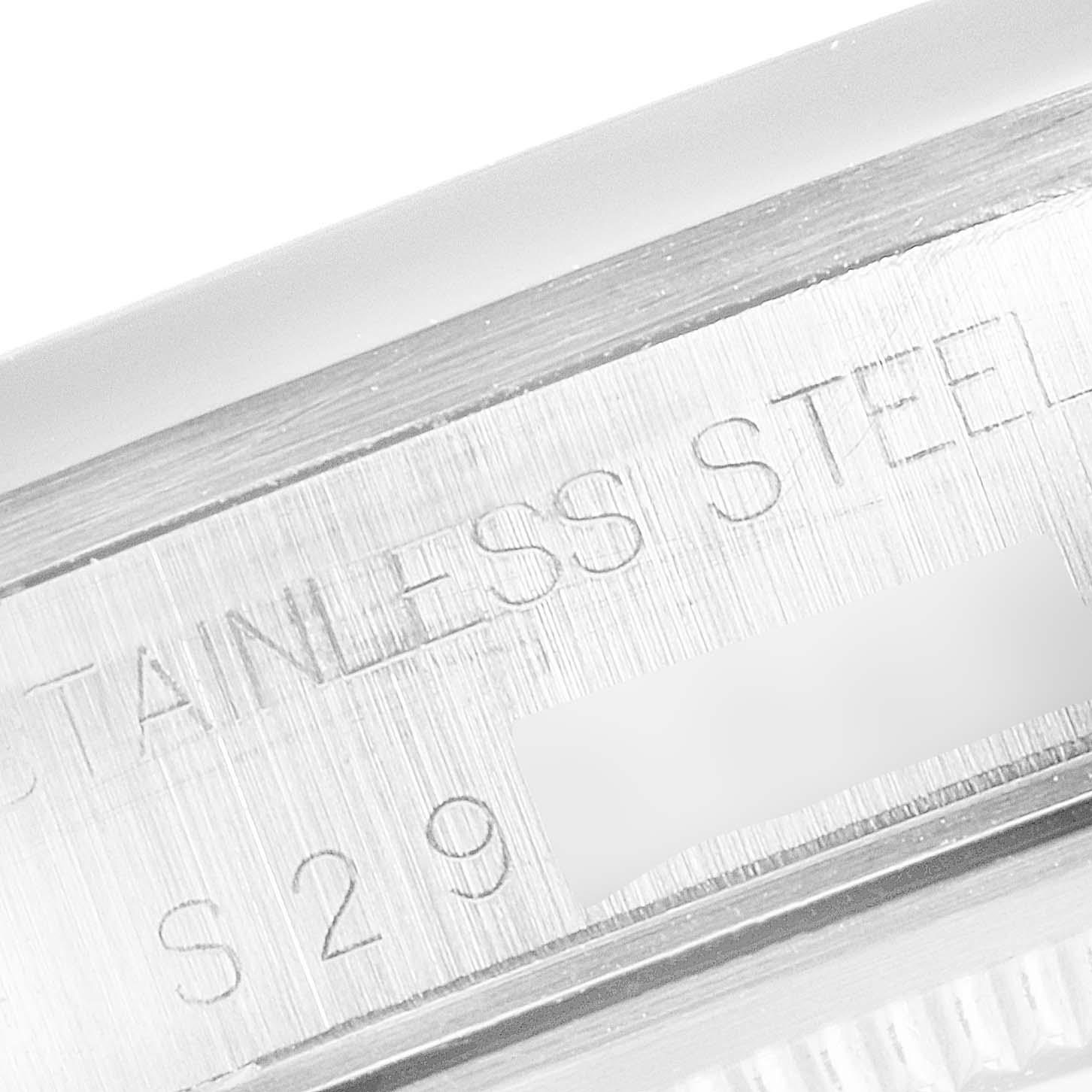 The image shows a close-up angle of the engraved stainless steel case back of a Rolex Air-King 14000 Men's Stainless Steel Silver Dial 14000 Men's Stainless Steel Silver Dial watch.