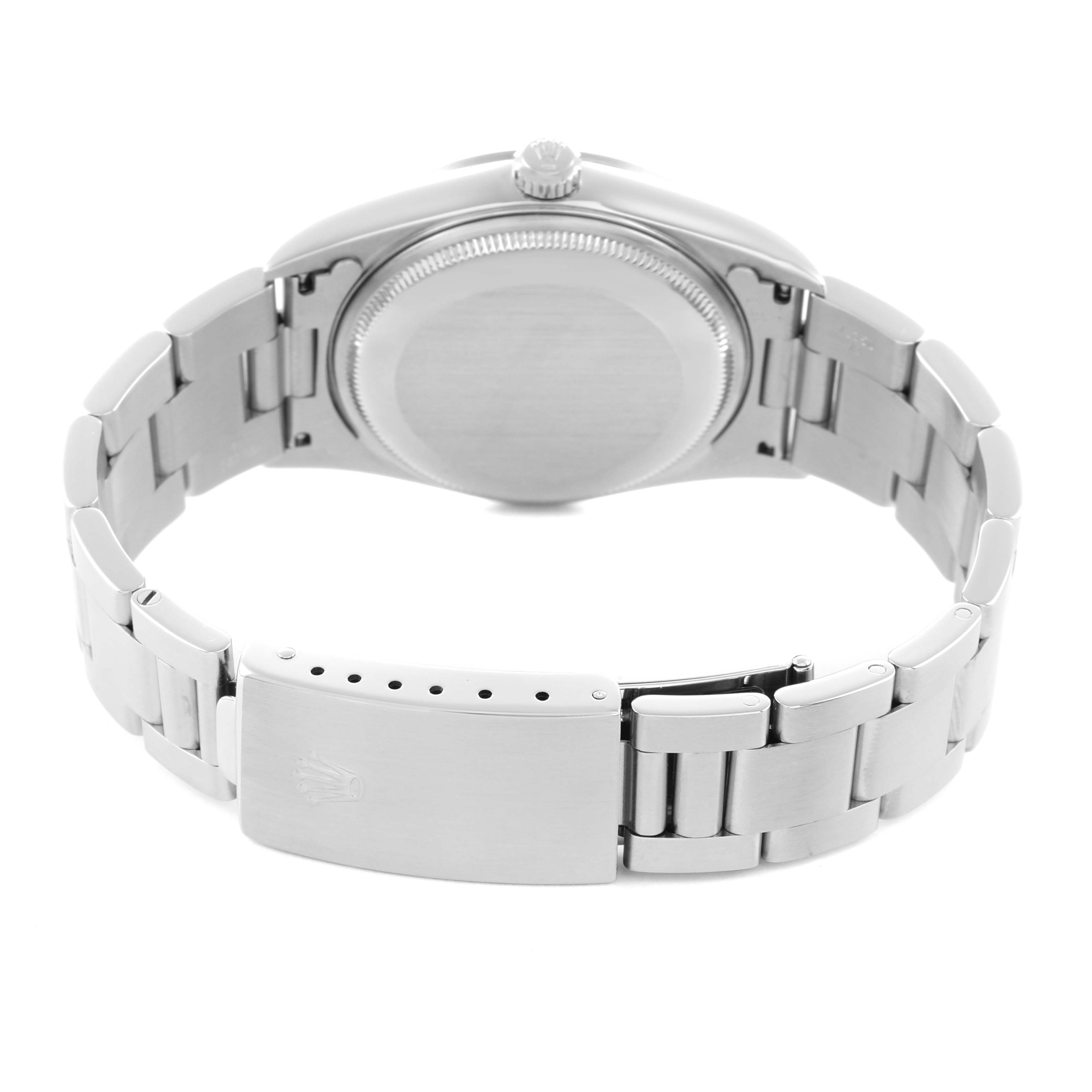 The Rolex Air-King 14000 Men
s Stainless Steel Silver Dial watch is shown from the back, highlighting the case back and bracelet clasp.