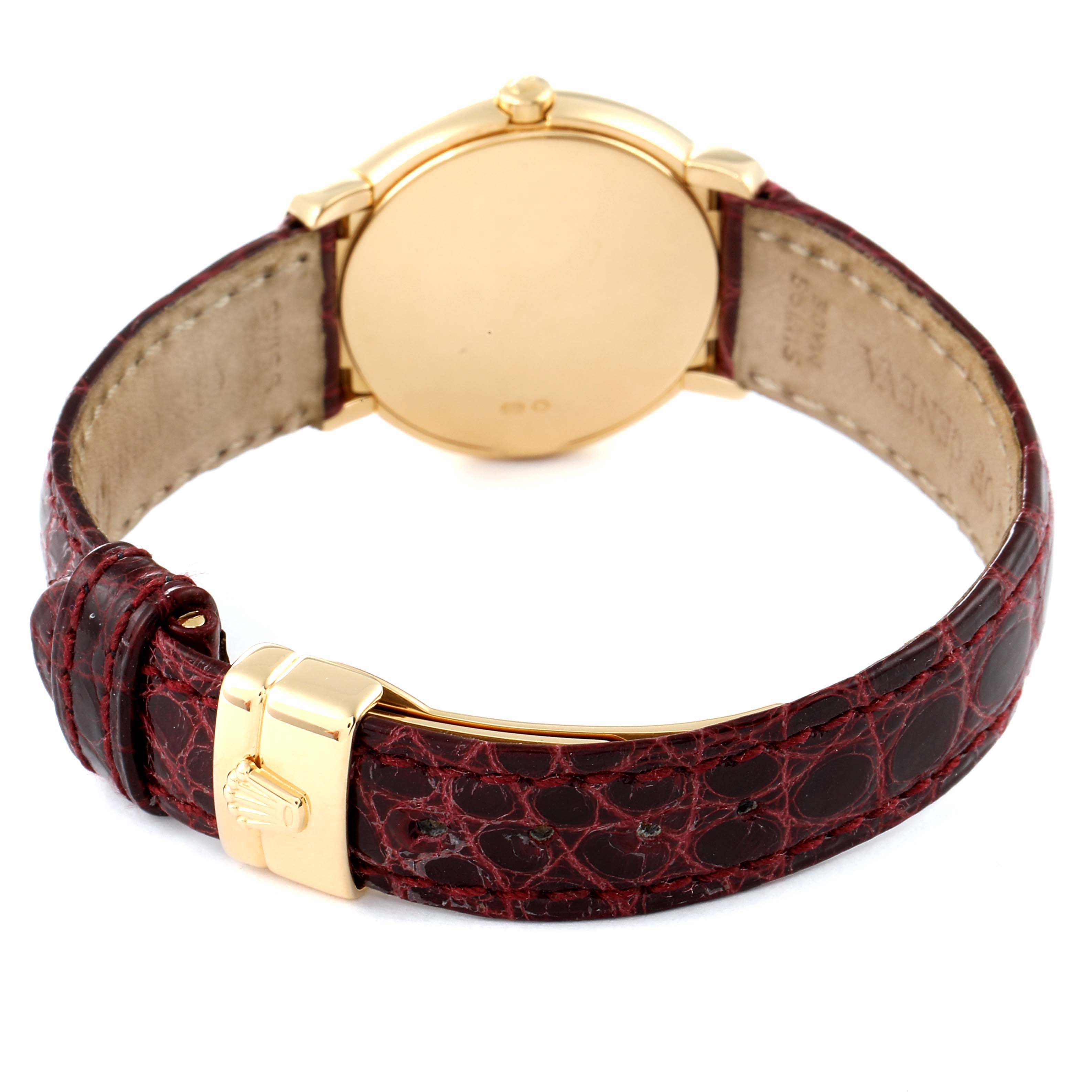 The image shows the back view of a Rolex Cellini 6621 Women's Yellow Gold White Dial 6621 Women's Yellow Gold White Dial watch with a closed caseback and an alligator leather strap.