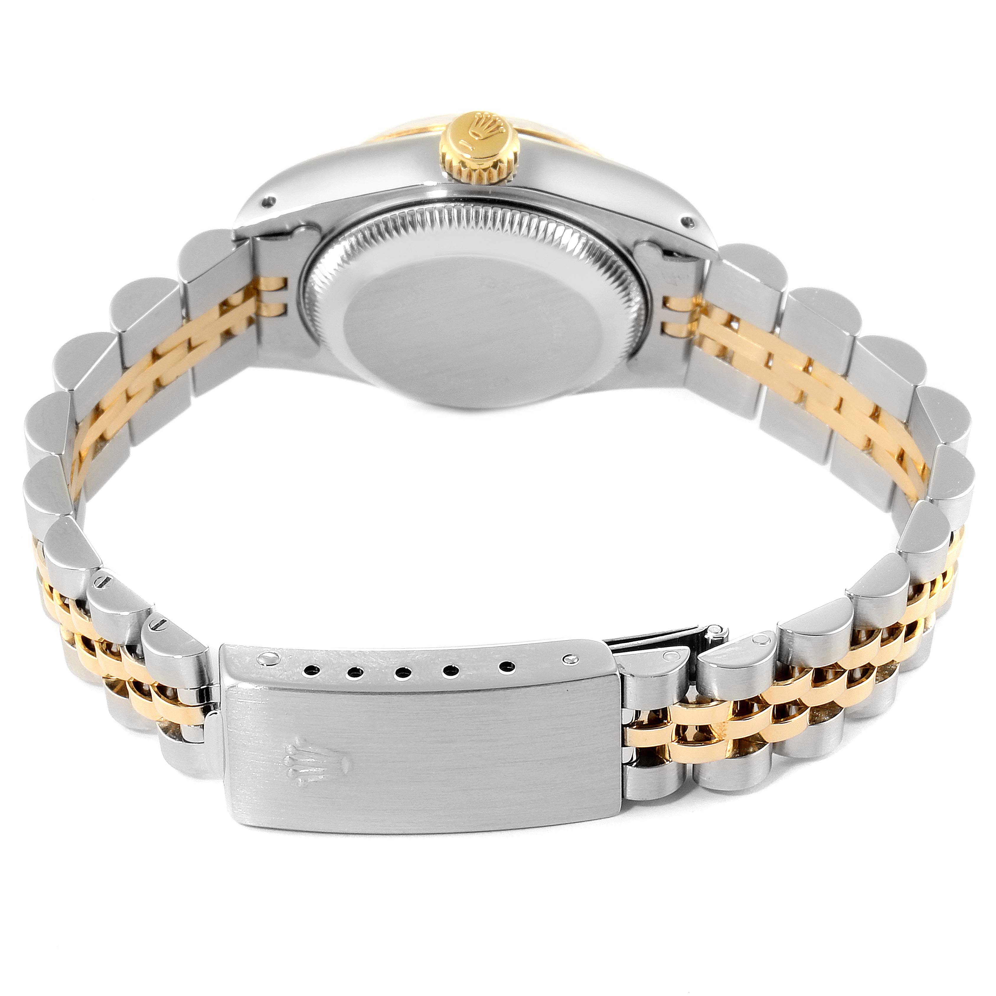 This image shows the back casing and clasp of a Rolex Datejust 69173 Women's Steel and Gold (two tone) Champagne Dial 69173 Women's Steel and Gold (two tone) Champagne Dial watch, including the two-tone bracelet and crown.
