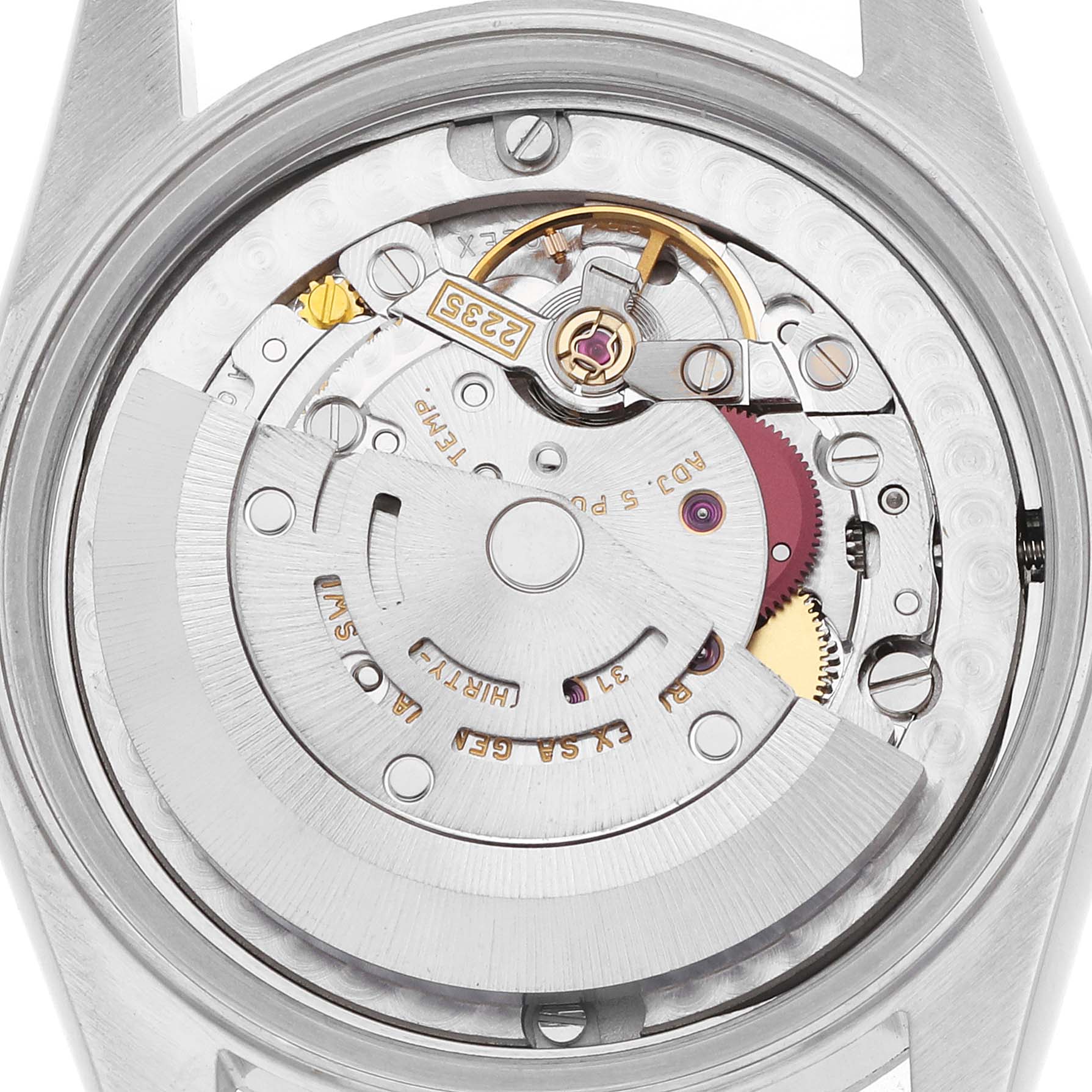 The image shows the movement of a Rolex Datejust 178274 Women
s Stainless Steel Silver Dial watch from the back, revealing its inner mechanical components.