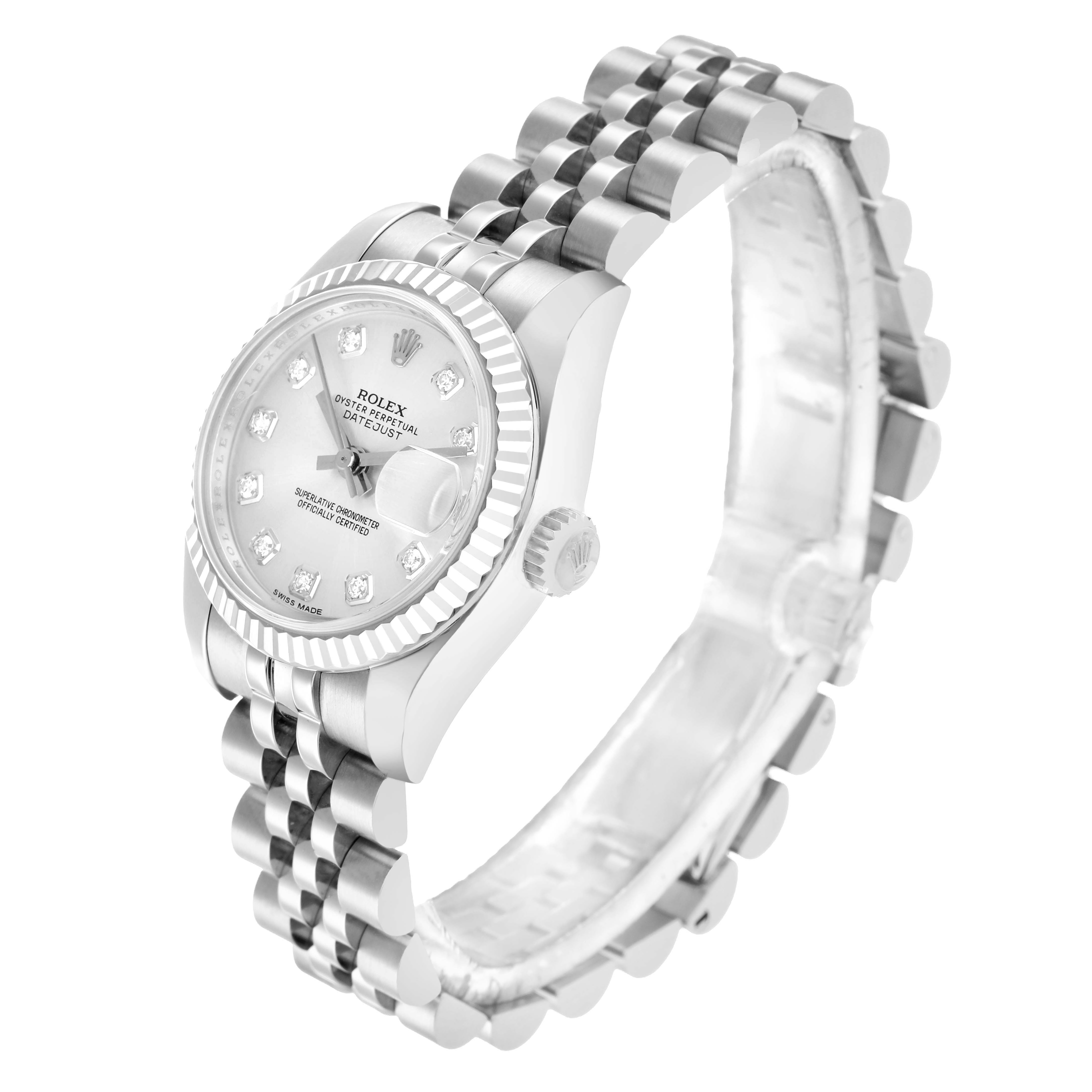 The Rolex Datejust 179174 Women
s Steel and Gold (two tone) Silver Dial watch is shown from a three-quarter angle, highlighting the face, bezel, crown, and Jubilee bracelet.