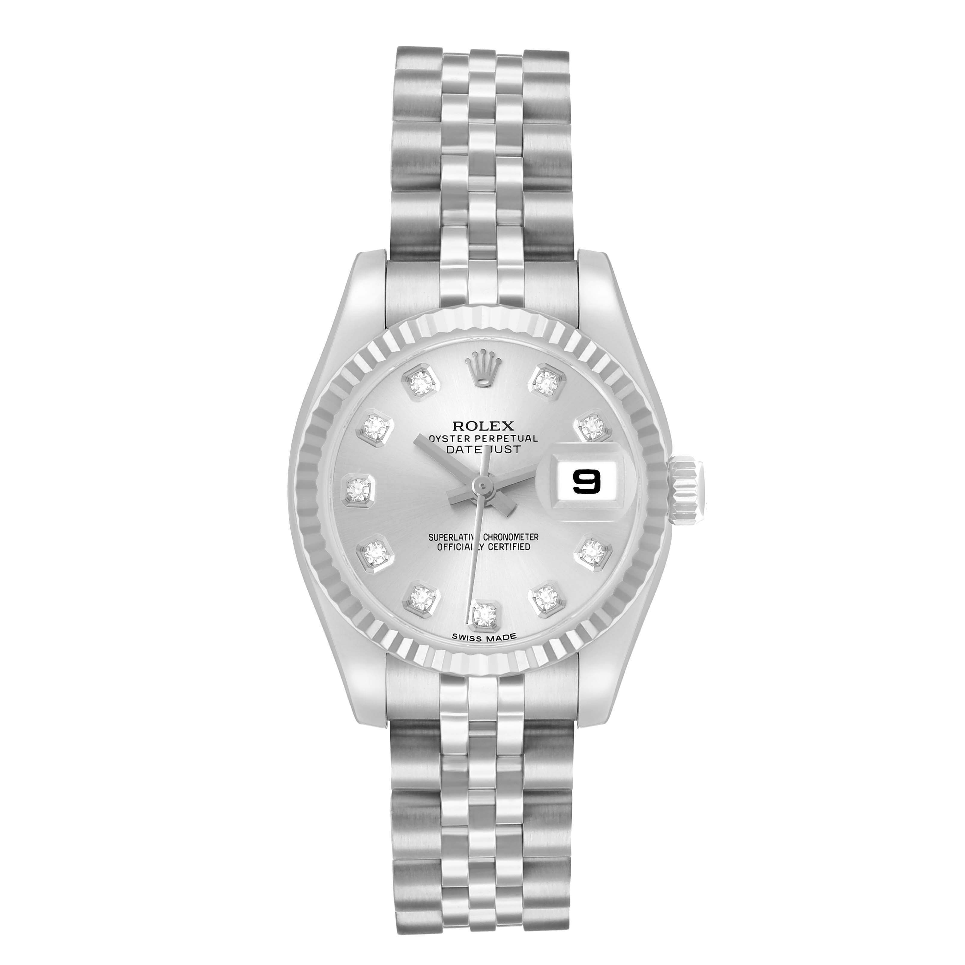 The Rolex Datejust 179174 Women
s Steel and Gold (two tone) Silver Dial watch is shown from a top-down angle, displaying the face, bezel, and bracelet.