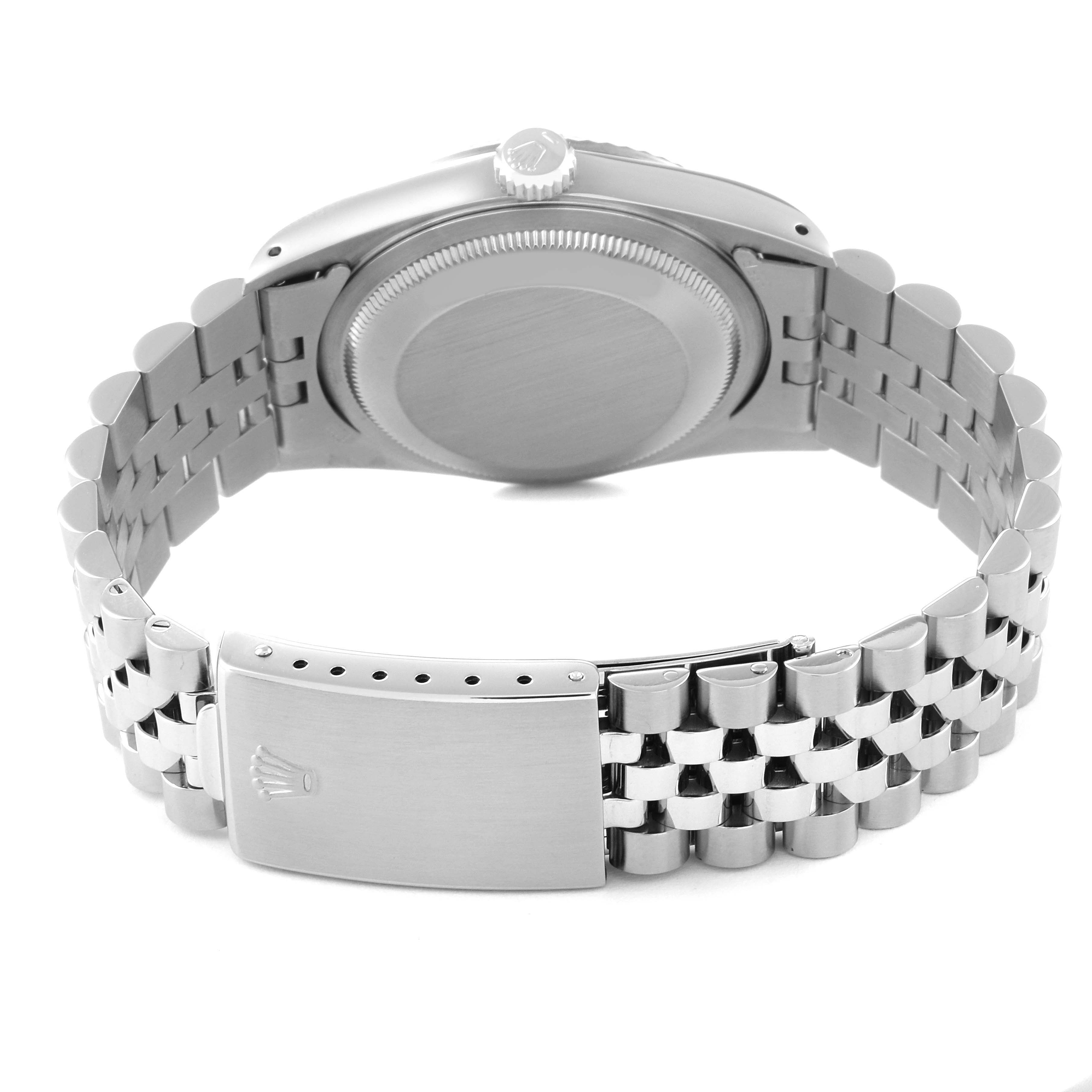 The image shows the back view of a Rolex Datejust 16234 Men's Stainless Steel Silver Dial 16234 Men's Stainless Steel Silver Dial watch, highlighting its case back, crown, and bracelet clasp.