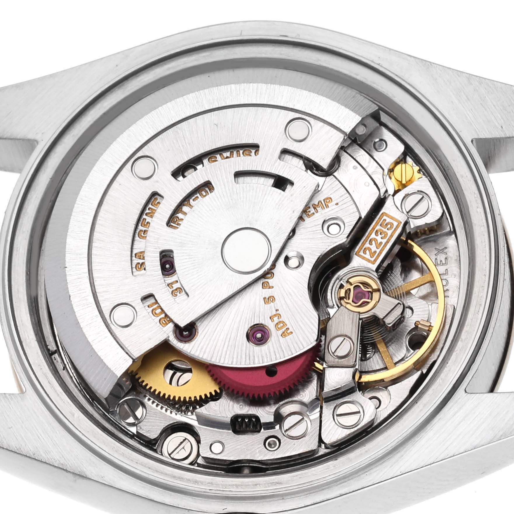 The image shows the inner mechanics and movement of a Rolex Datejust 79163 Women
s Steel and Gold (two tone) Champagne Dial 79163 Women
s Steel and Gold (two tone) Champagne Dial watch viewed from the back.