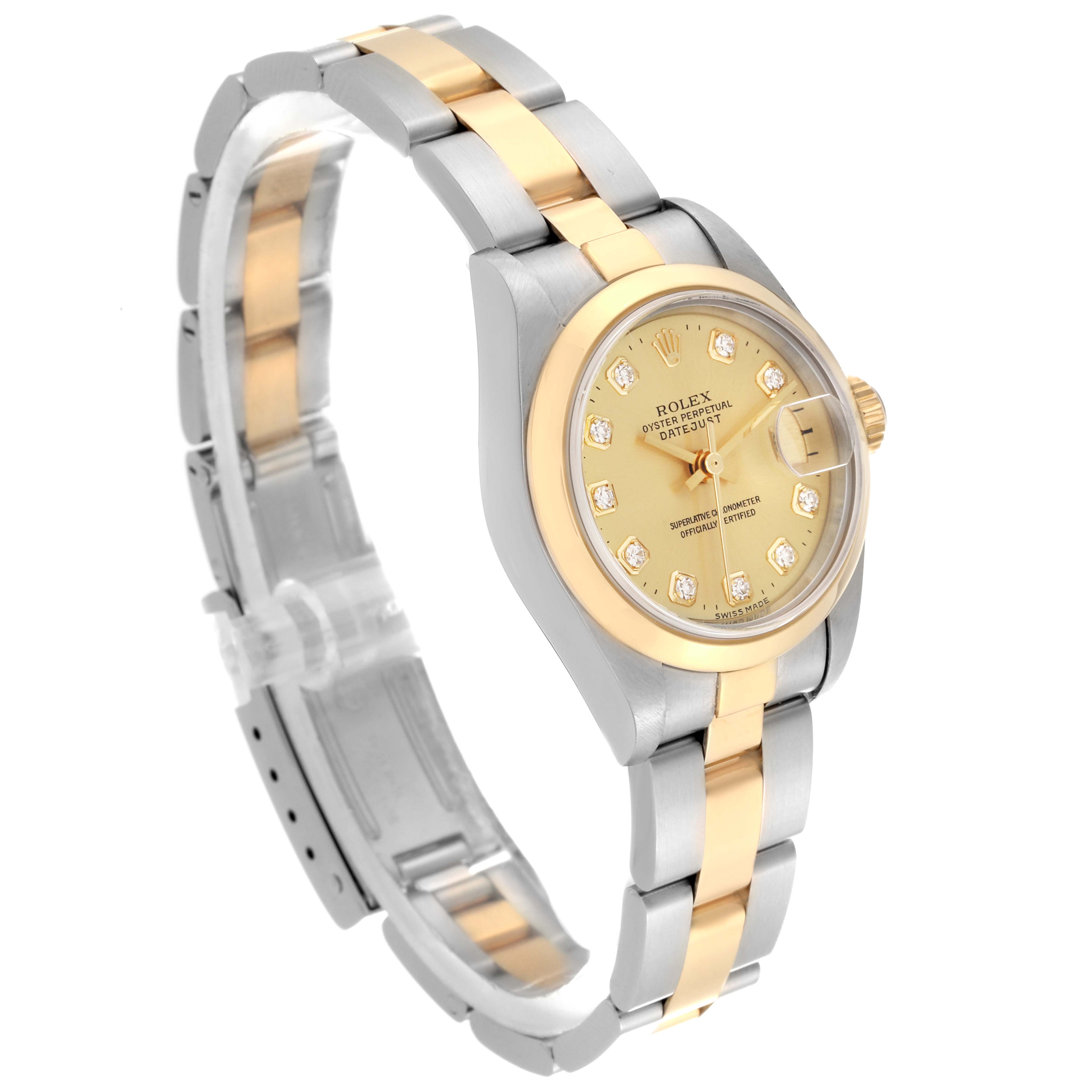 The image shows a side angle view of a Rolex Datejust 79163 Women
s Steel and Gold (two tone) Champagne Dial 79163 Women
s Steel and Gold (two tone) Champagne Dial watch, highlighting its two-tone bracelet, dial, and case.