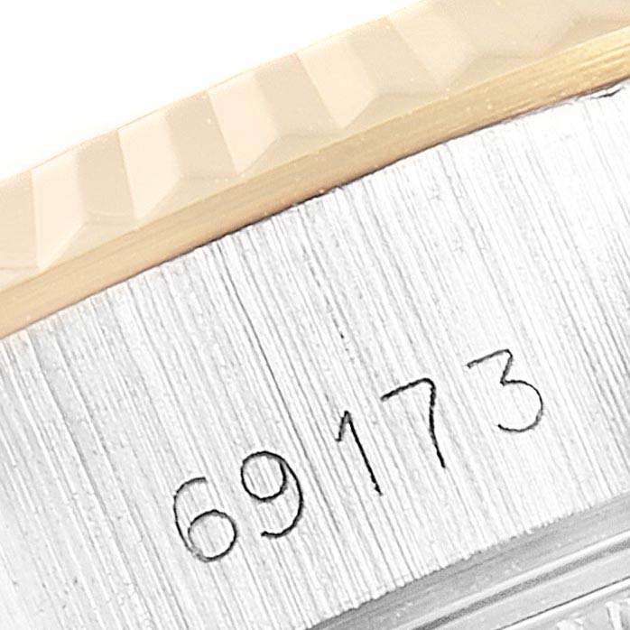 This close-up image of a Rolex Datejust 69173 Women's Steel and Gold (two tone) Champagne Dial 69173 Women's Steel and Gold (two tone) Champagne Dial shows the model number "69173" on the case near the fluted bezel.