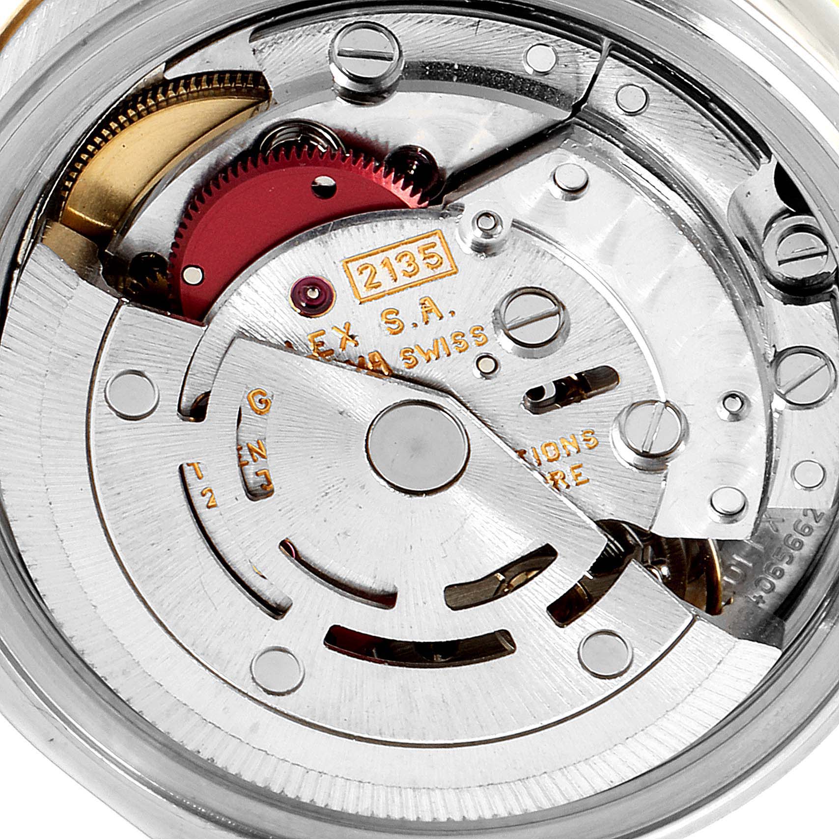This image shows a close-up view of the movement mechanism of a Rolex Datejust 69173 Women's Steel and Gold (two tone) Silver Dial 69173 Women's Steel and Gold (two tone) Silver Dial watch.