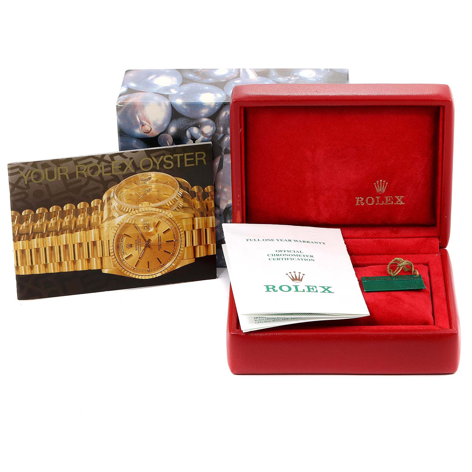 The image shows the box and accessories of a Rolex Datejust 69173 Women's Steel and Gold (two tone) Silver Dial 69173 Women's Steel and Gold (two tone) Silver Dial watch, including manuals and a warranty card.