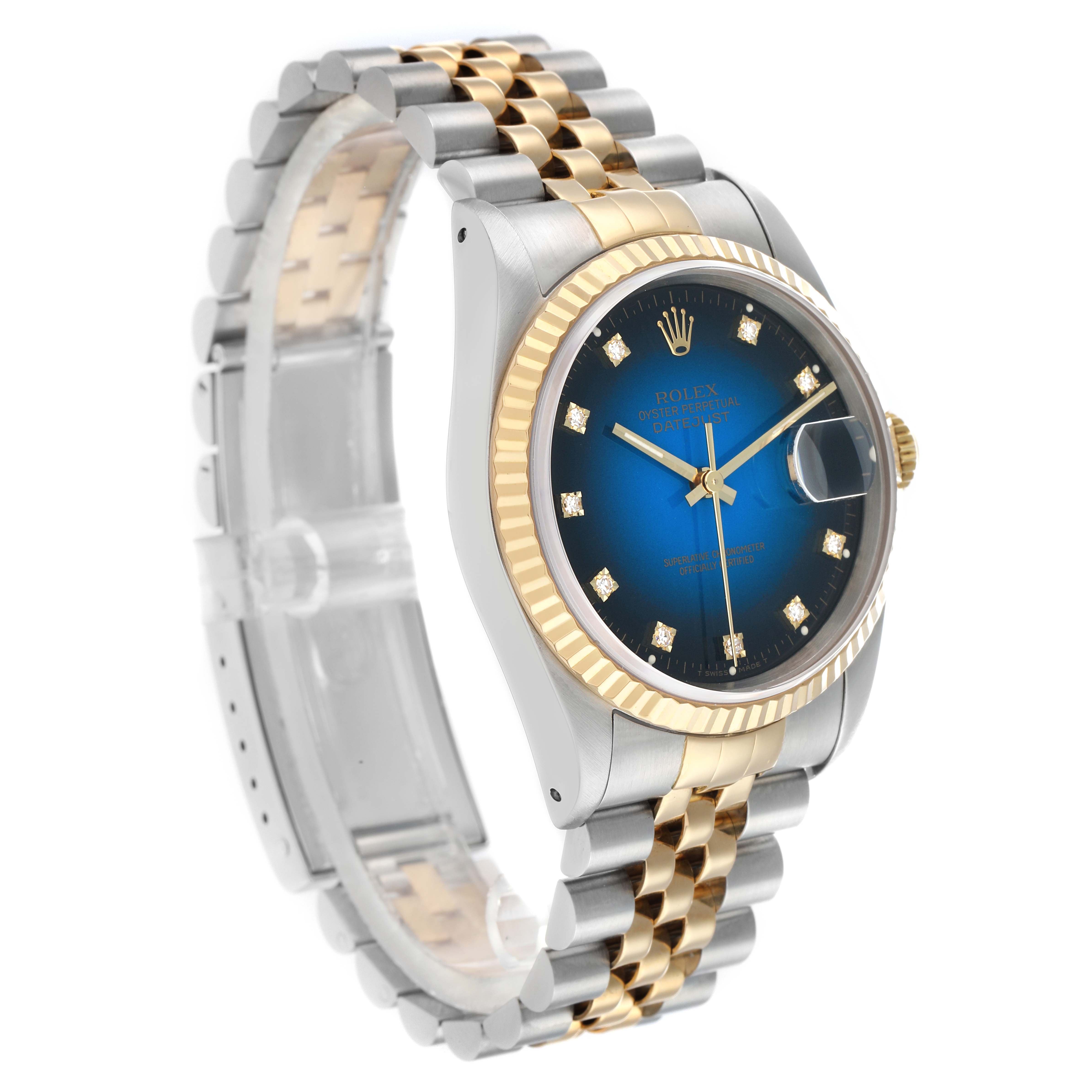 The Rolex Datejust 16233 Men
s Steel and Gold (two tone) Blue Dial watch is shown at an angled side view, highlighting the bracelet, bezel, and face.