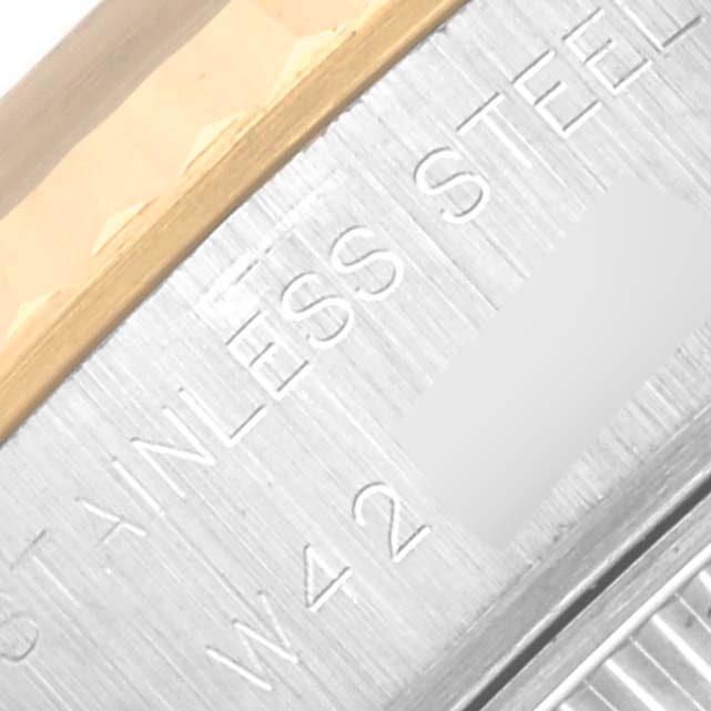 This image shows a close-up of the case back and stainless steel markings of a Rolex Datejust 69173 Women
s Steel and Gold (two tone) White Dial 69173 Women
s Steel and Gold (two tone) White Dial watch.