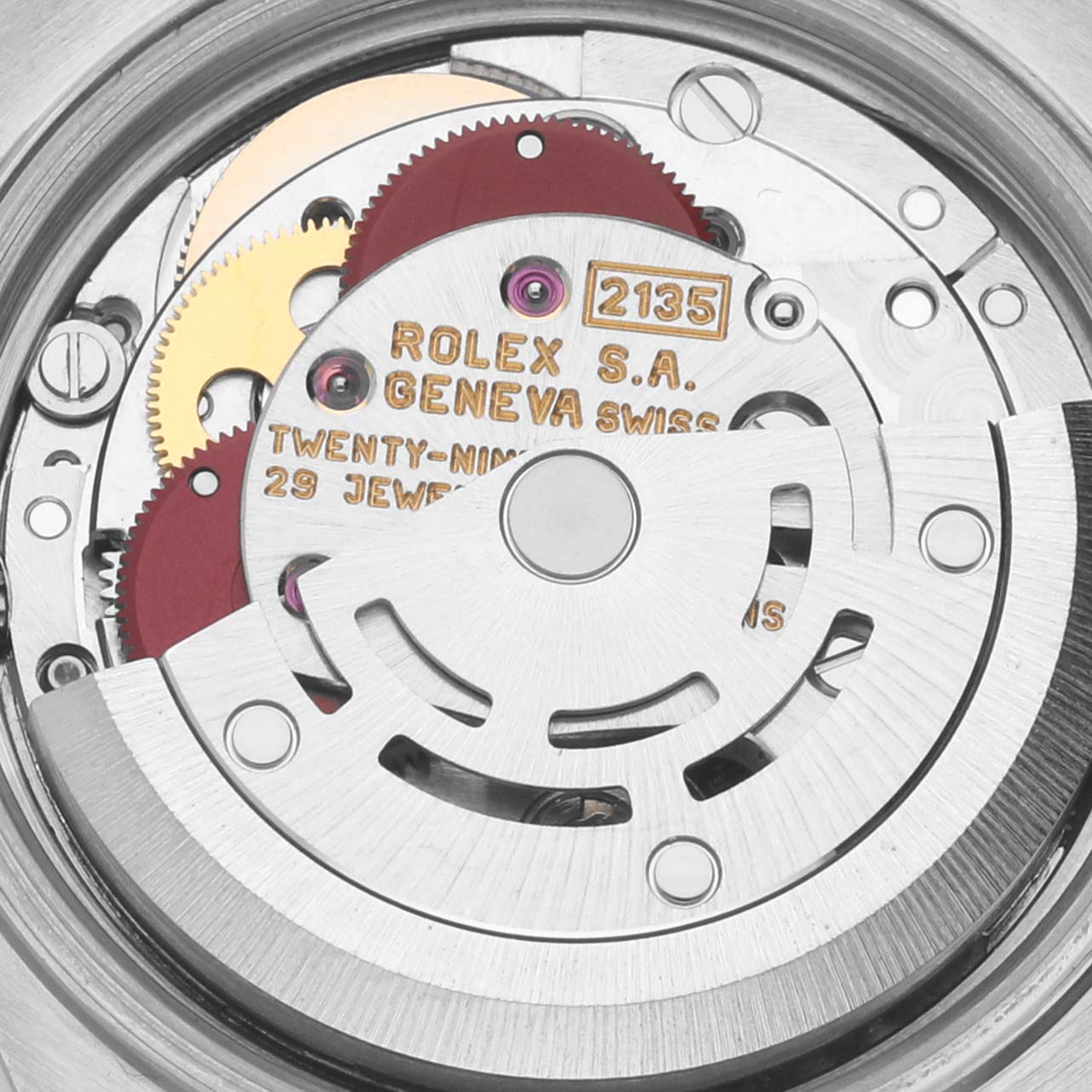 The image shows a close-up of the movement mechanism inside a Rolex Datejust 69173 Women
s Steel and Gold (two tone) White Dial 69173 Women
s Steel and Gold (two tone) White Dial watch.