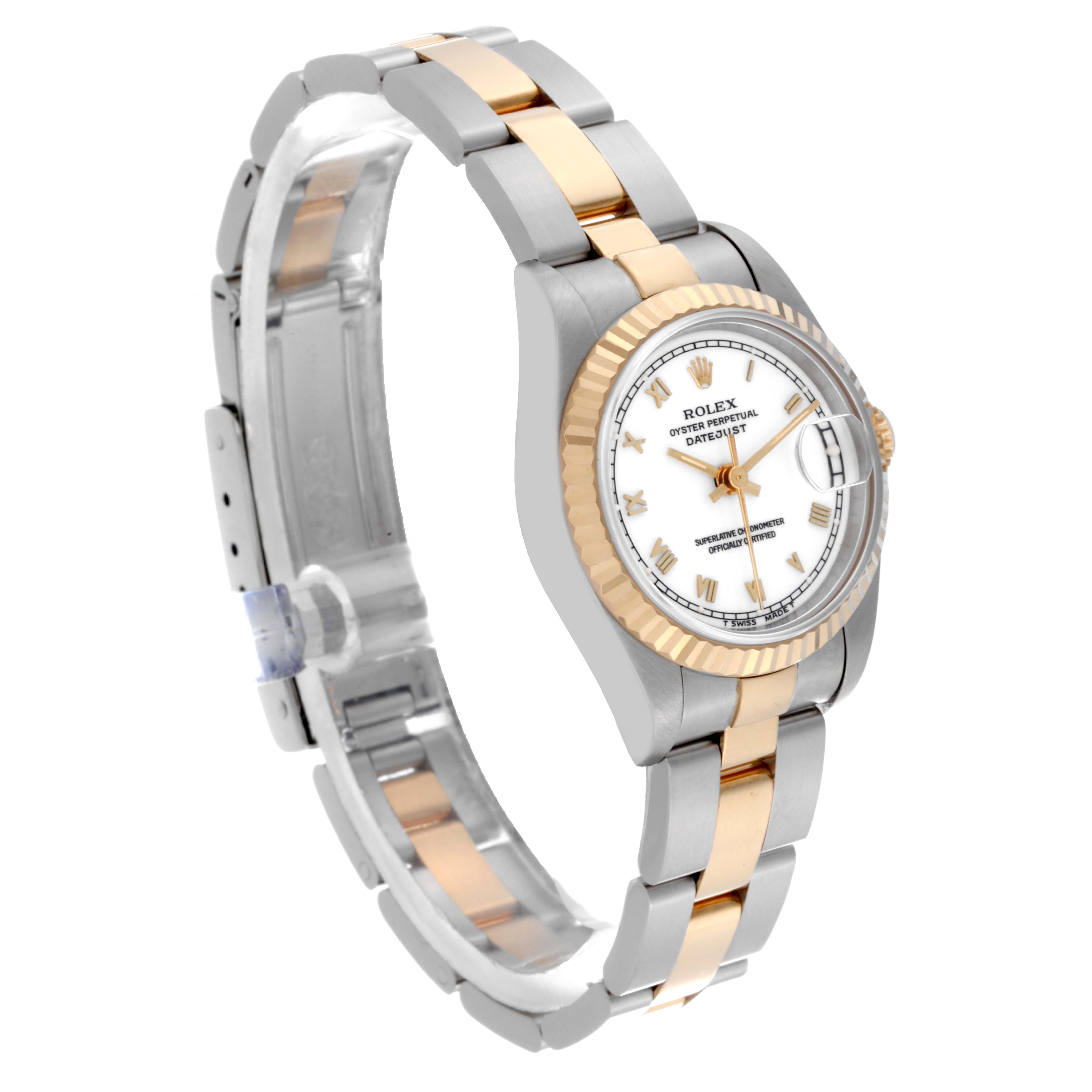 The Rolex Datejust 69173 Women
s Steel and Gold (two tone) White Dial 69173 Women
s Steel and Gold (two tone) White Dial watch is shown at a slight angle displaying the face, bezel, and bracelet.