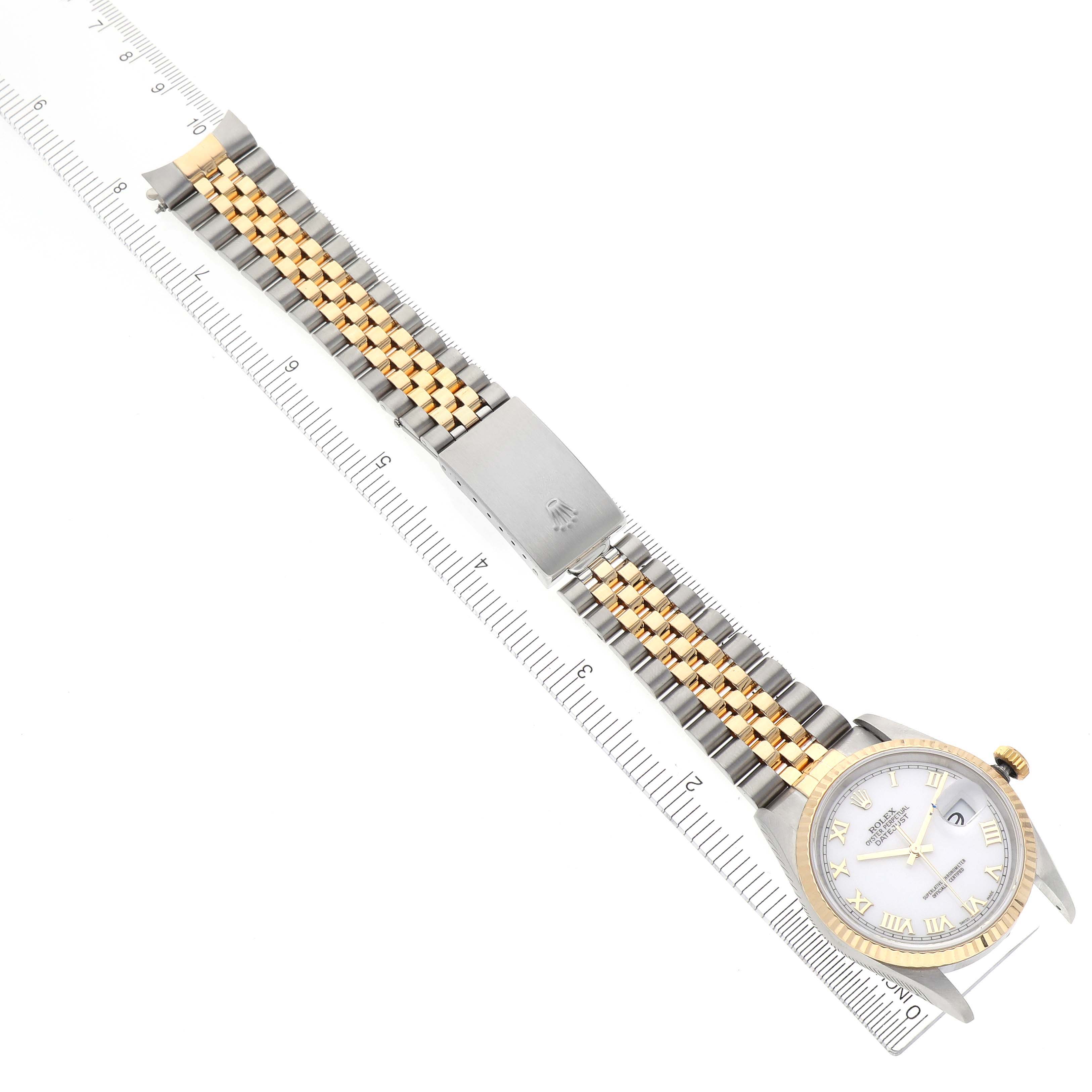 The image shows a Rolex Datejust 16233 Men's Steel and Gold (two tone) White Dial 16233 Men's Steel and Gold (two tone) White Dial watch laid flat with its Jubilee bracelet extended horizontally.
