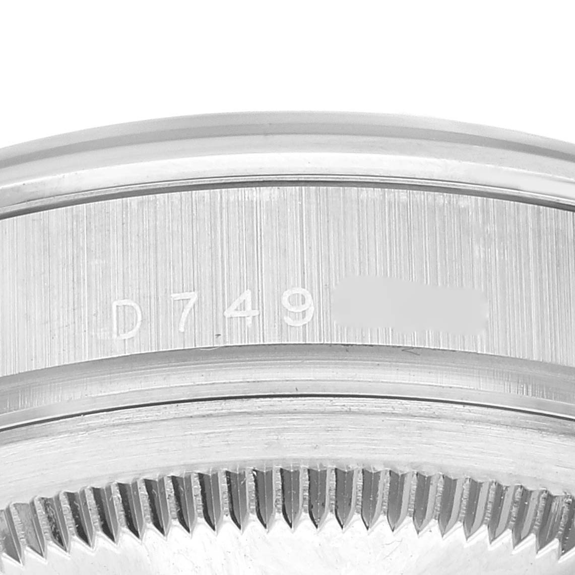 The image shows a close-up view of the case back and serial number of a Rolex President 118206 Men's Platinum Silver Dial 118206 Men's Platinum Silver Dial model watch.