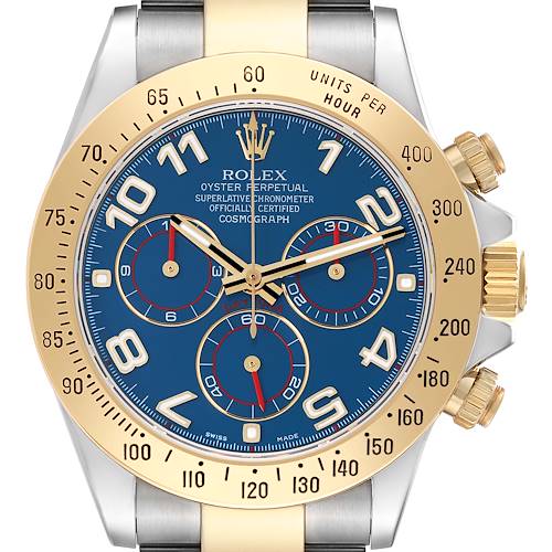 This is a front view of a Rolex Daytona watch, showcasing its gold bezel, blue dial, and chronograph subdials.