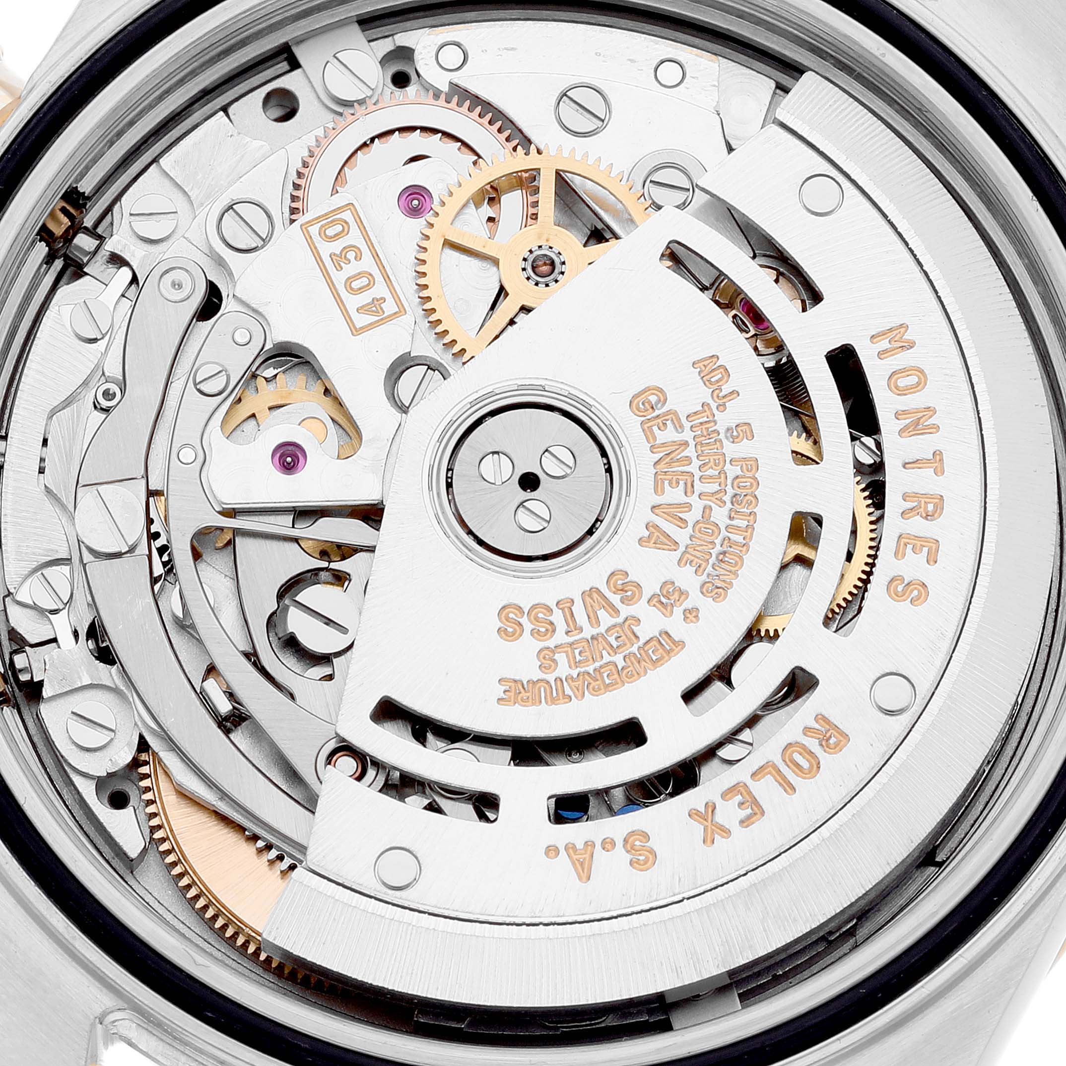 This image shows a close-up view of the internal movement mechanism of a Rolex Daytona 16523 Men's Steel and Gold (two tone) White Dial 16523 Men's Steel and Gold (two tone) White Dial watch.