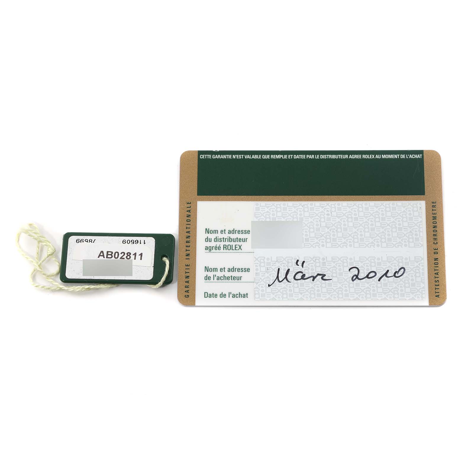 The image shows a Rolex Daytona 116509 Men's White Gold Silver Dial 116509 Men's White Gold Silver Dial warranty card and hang tag, viewed from the top.