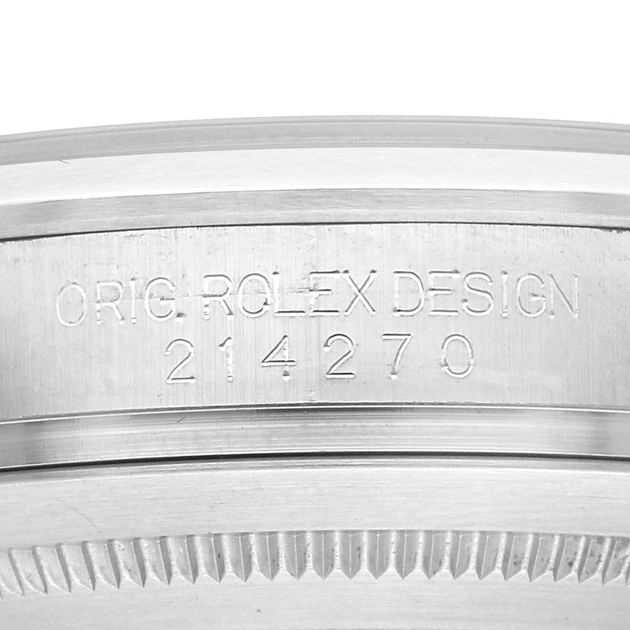 The image shows a close-up of the case side of a Rolex Explorer 214270 Men
s Stainless Steel Black Dial with engraved text and model number.