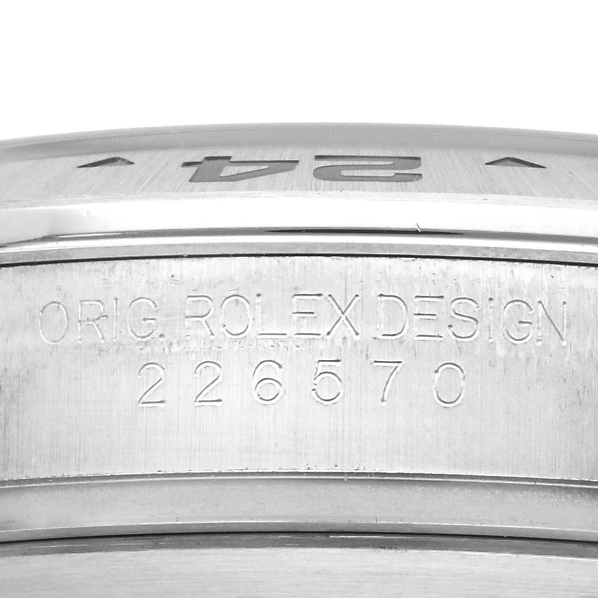 This image shows a close-up of the case side of a Rolex Explorer 226570 Men's Stainless Steel White Dial 226570 Men's Stainless Steel White Dial watch, displaying the engraved model number and design information.