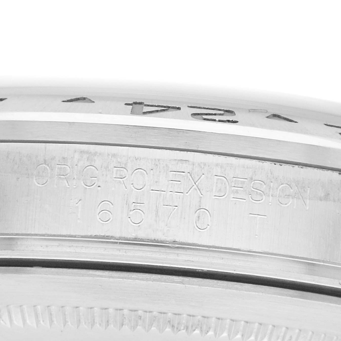 The image shows a close-up of the side engraving on a Rolex Explorer 16570 Men
s Stainless Steel White Dial watch, including the model number.