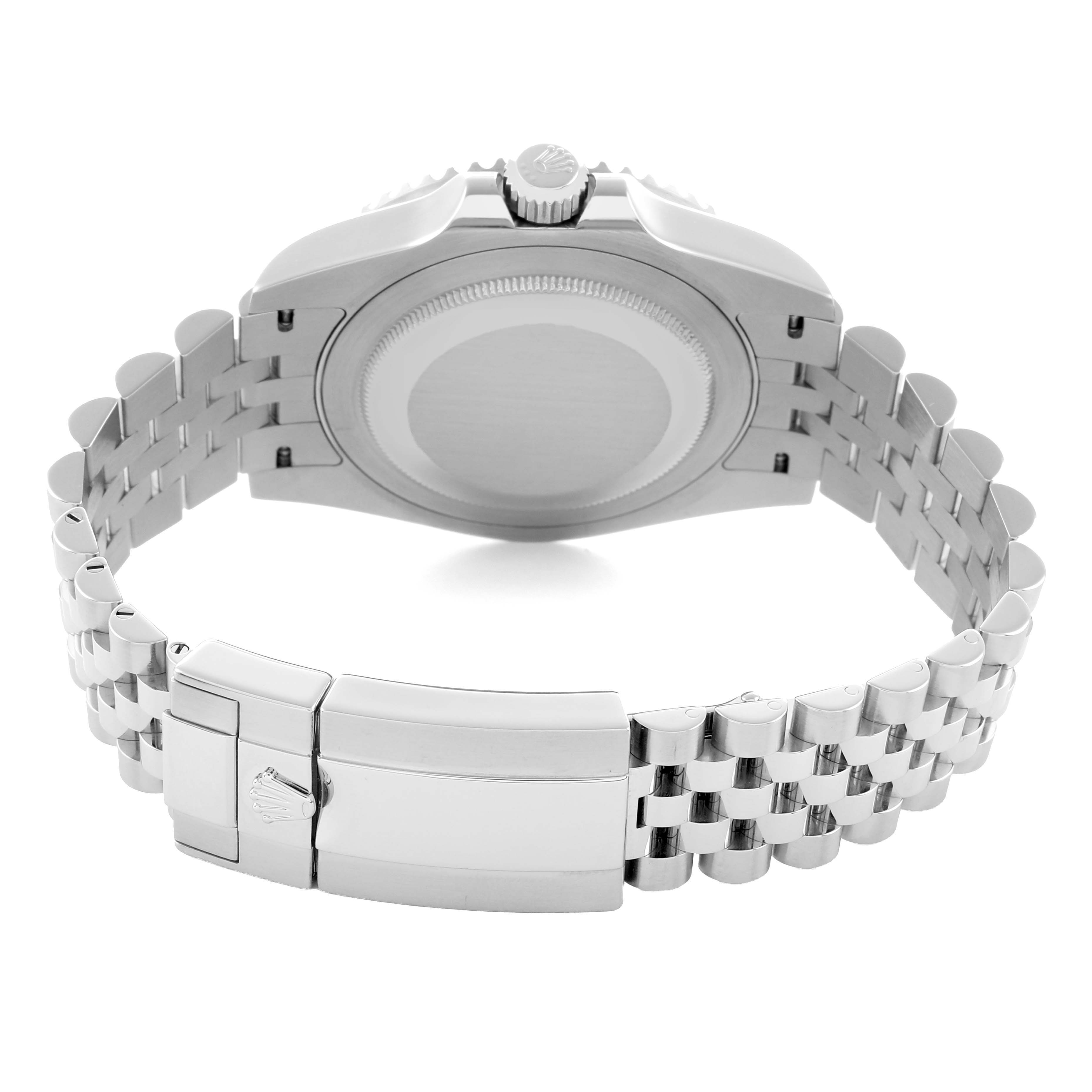 The Rolex GMT-Master 126710 Men
s Stainless Steel Black Dial watch is shown from the back, highlighting the case back and bracelet clasp.