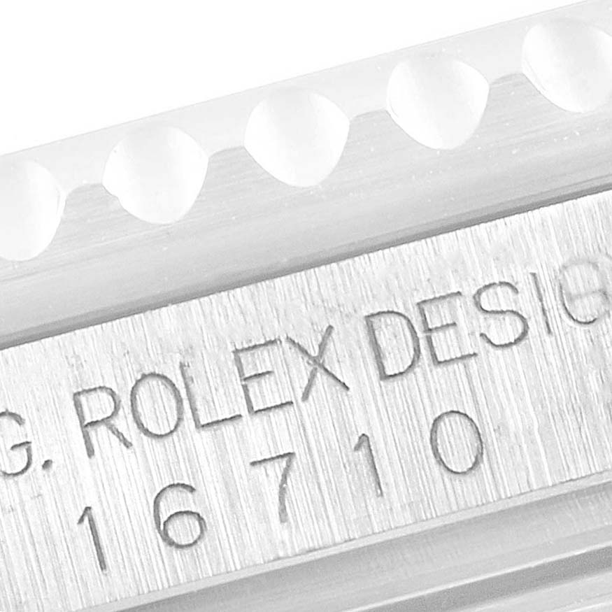 This image shows an angled view of the case side and reference number of a Rolex GMT-Master 16710 Men
s Stainless Steel Black Dial 16710 Men
s Stainless Steel Black Dial model.