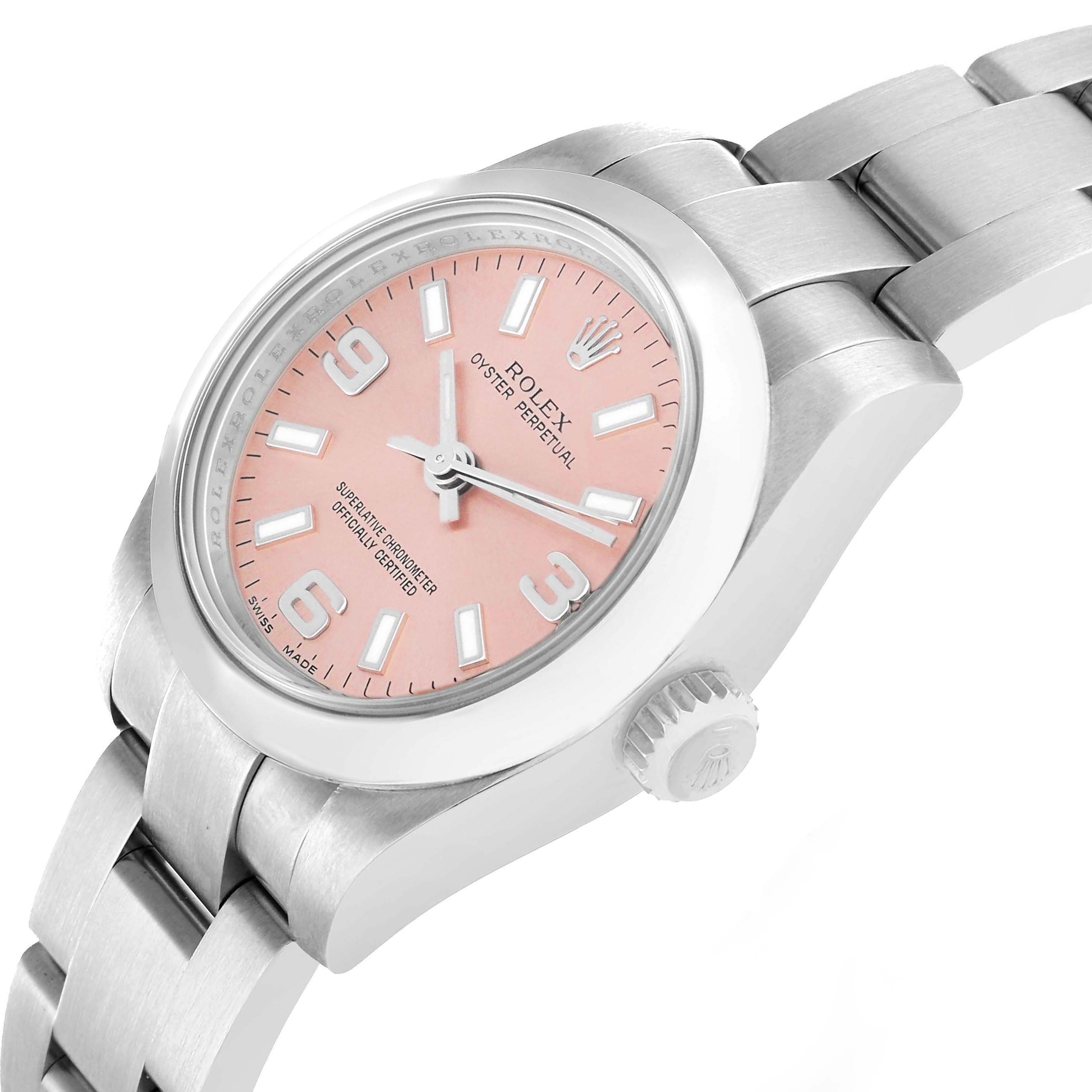 The Rolex Oyster Perpetual 176200 Women
s Stainless Steel Pink Dial watch is shown from an angled side view, displaying the bracelet, case, and crown.