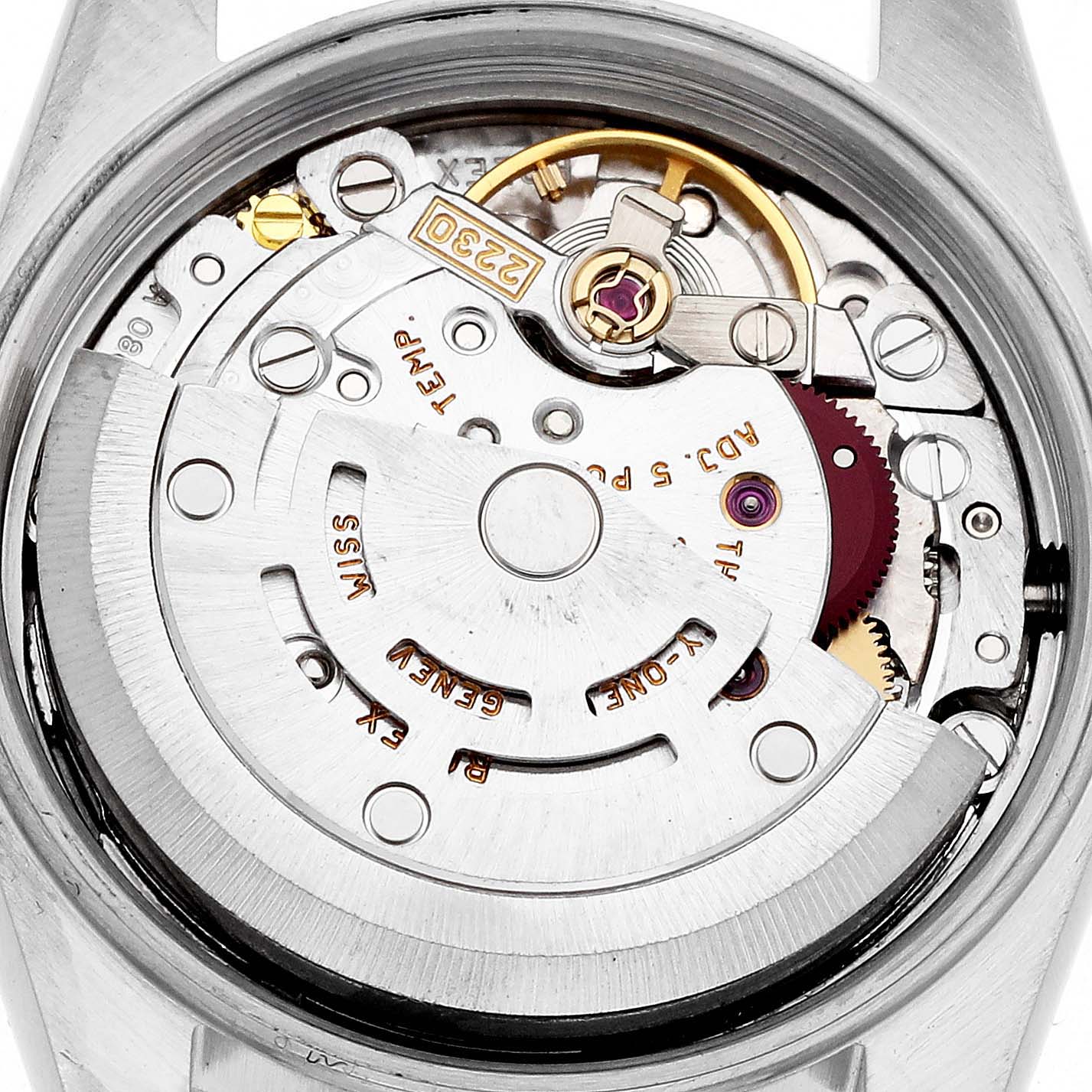 The image shows the movement of a Rolex Oyster Perpetual 76080 Women
s Stainless Steel Silver Dial watch from a top-down angle, highlighting its intricate mechanics.