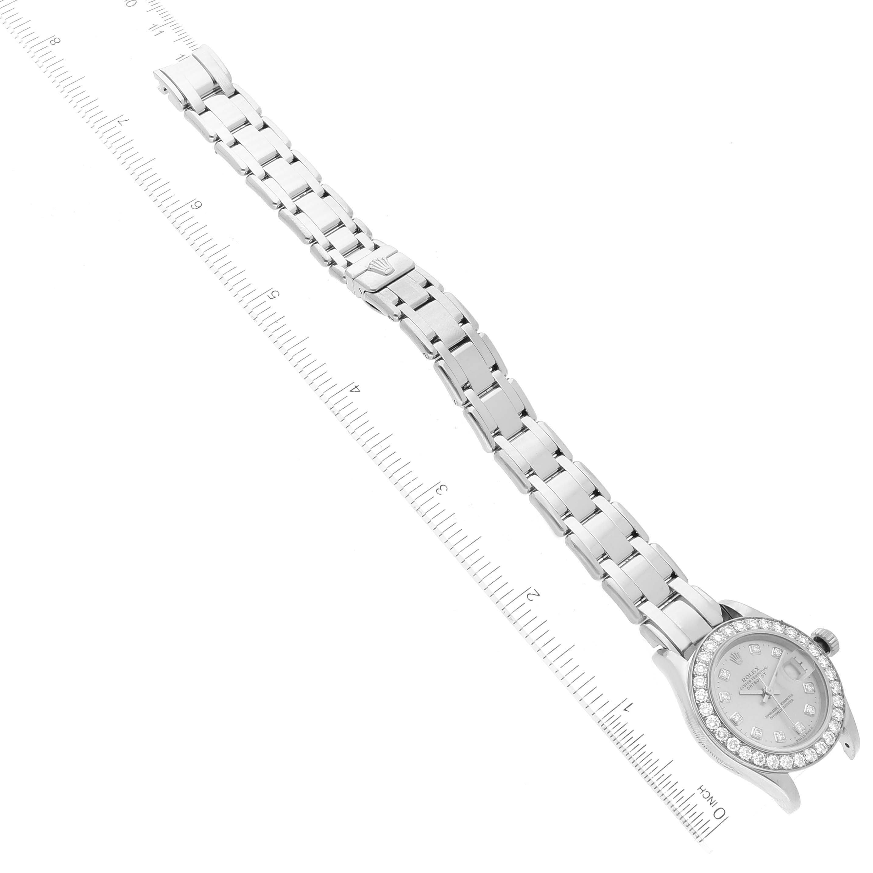 The image shows a Rolex Pearlmaster 80299 Women's White Gold Silver Dial 80299 Women's White Gold Silver Dial watch laid flat on its side, with a ruler indicating its size.